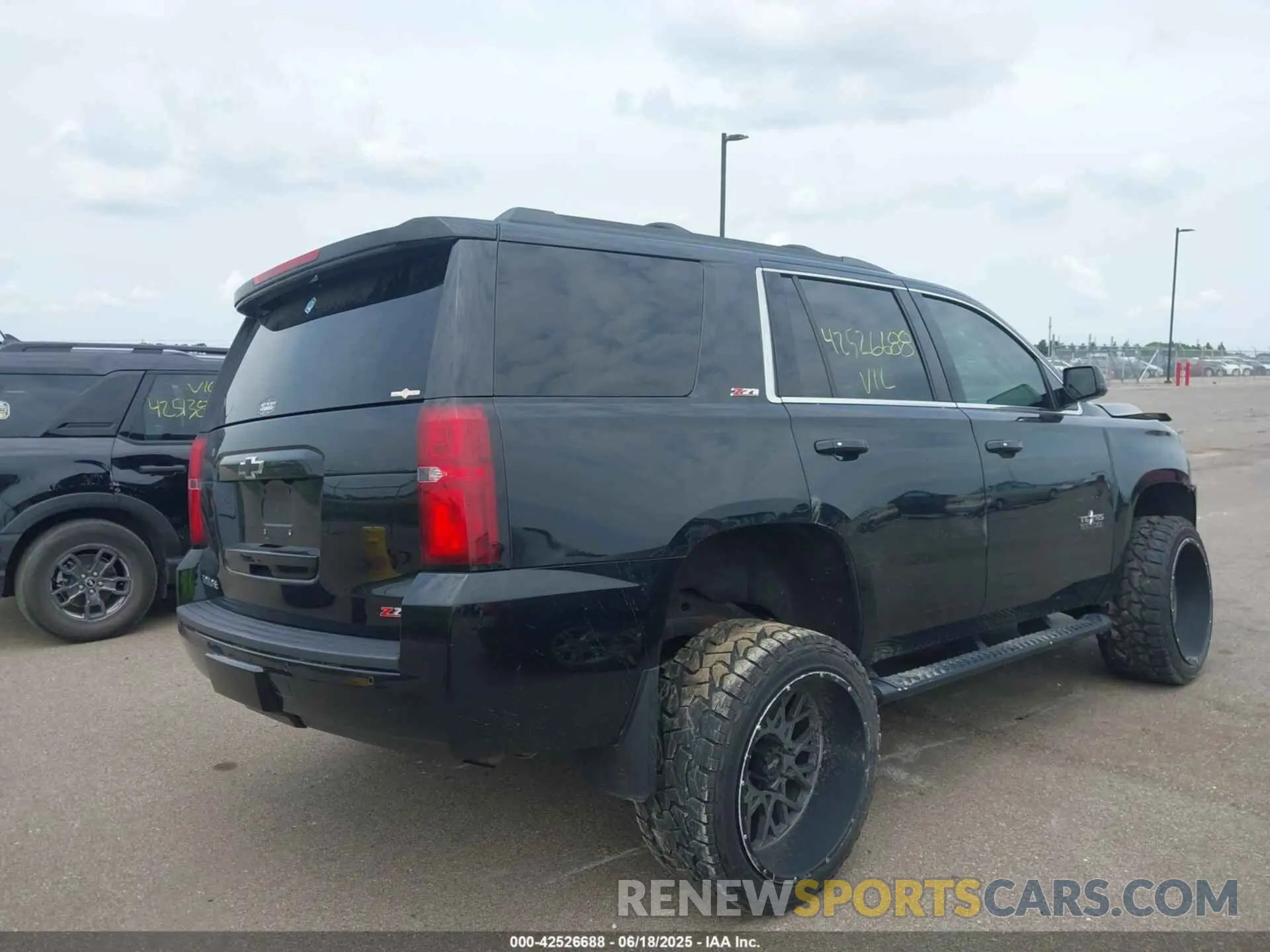 4 Photograph of a damaged car 1GNSKBKC9LR129187 CHEVROLET TAHOE 2020
