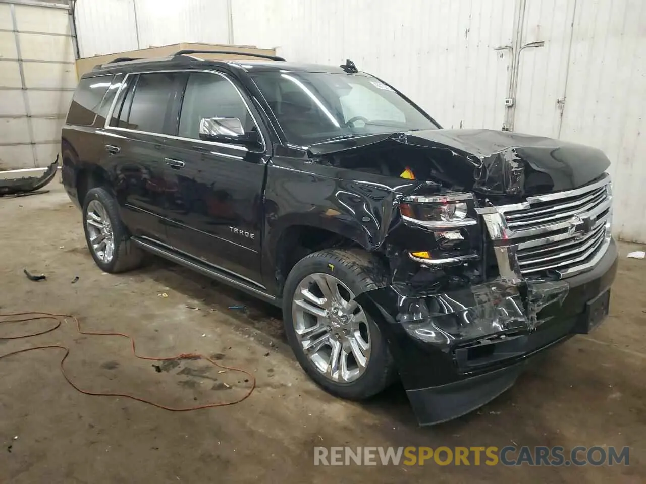 4 Photograph of a damaged car 1GNSKCKJ5LR122385 CHEVROLET TAHOE 2020