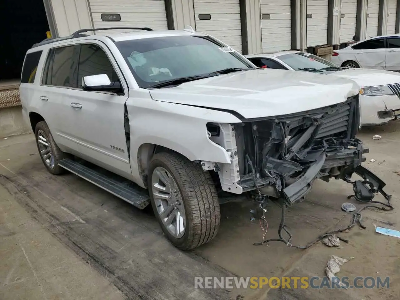 4 Photograph of a damaged car 1GNSKCKJ7LR307957 CHEVROLET TAHOE 2020
