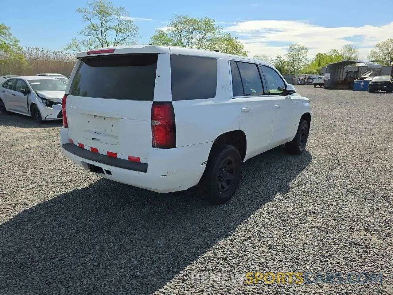4 Photograph of a damaged car 1GNSKDEC1LR229808 CHEVROLET TAHOE 2020
