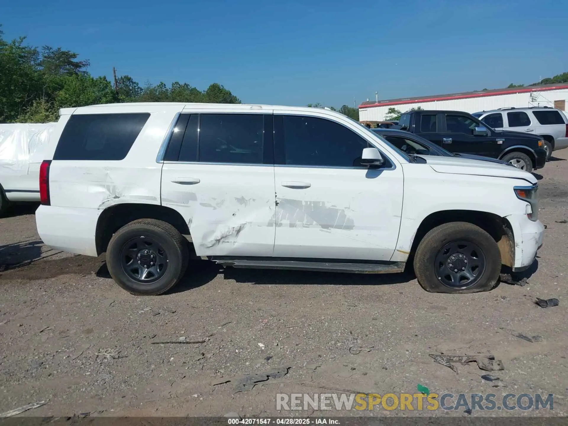 13 Photograph of a damaged car 1GNSKDEC7LR124772 CHEVROLET TAHOE 2020