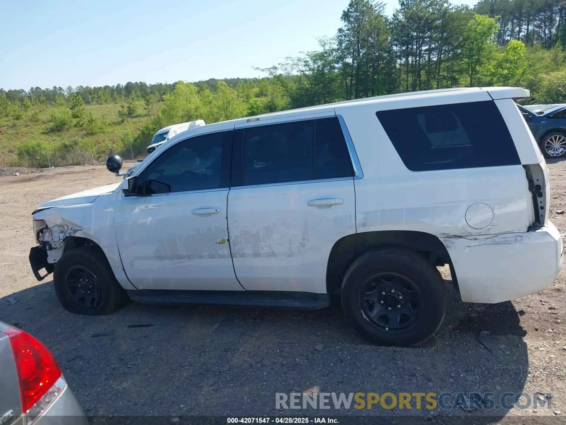 14 Photograph of a damaged car 1GNSKDEC7LR124772 CHEVROLET TAHOE 2020