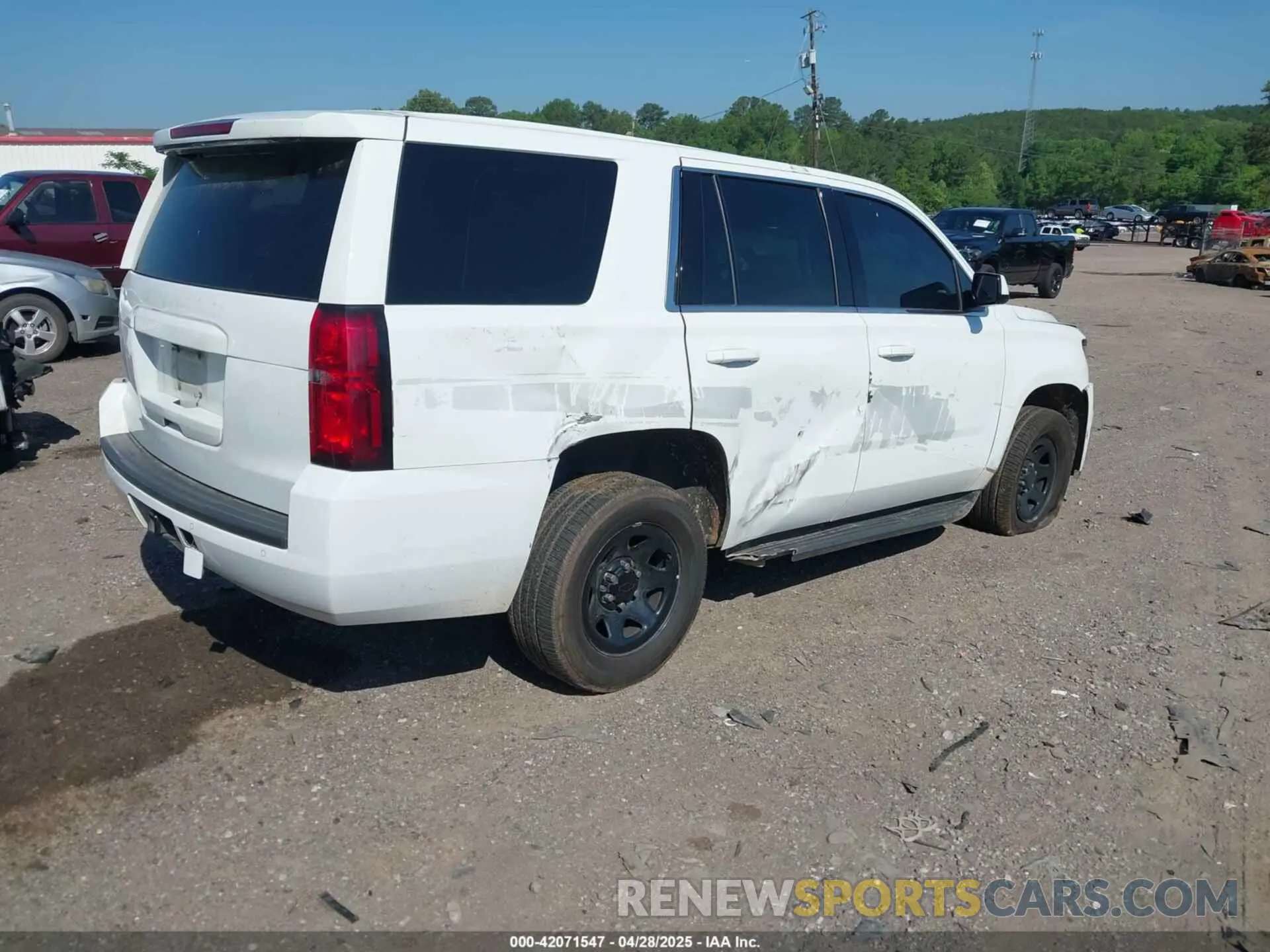 4 Photograph of a damaged car 1GNSKDEC7LR124772 CHEVROLET TAHOE 2020