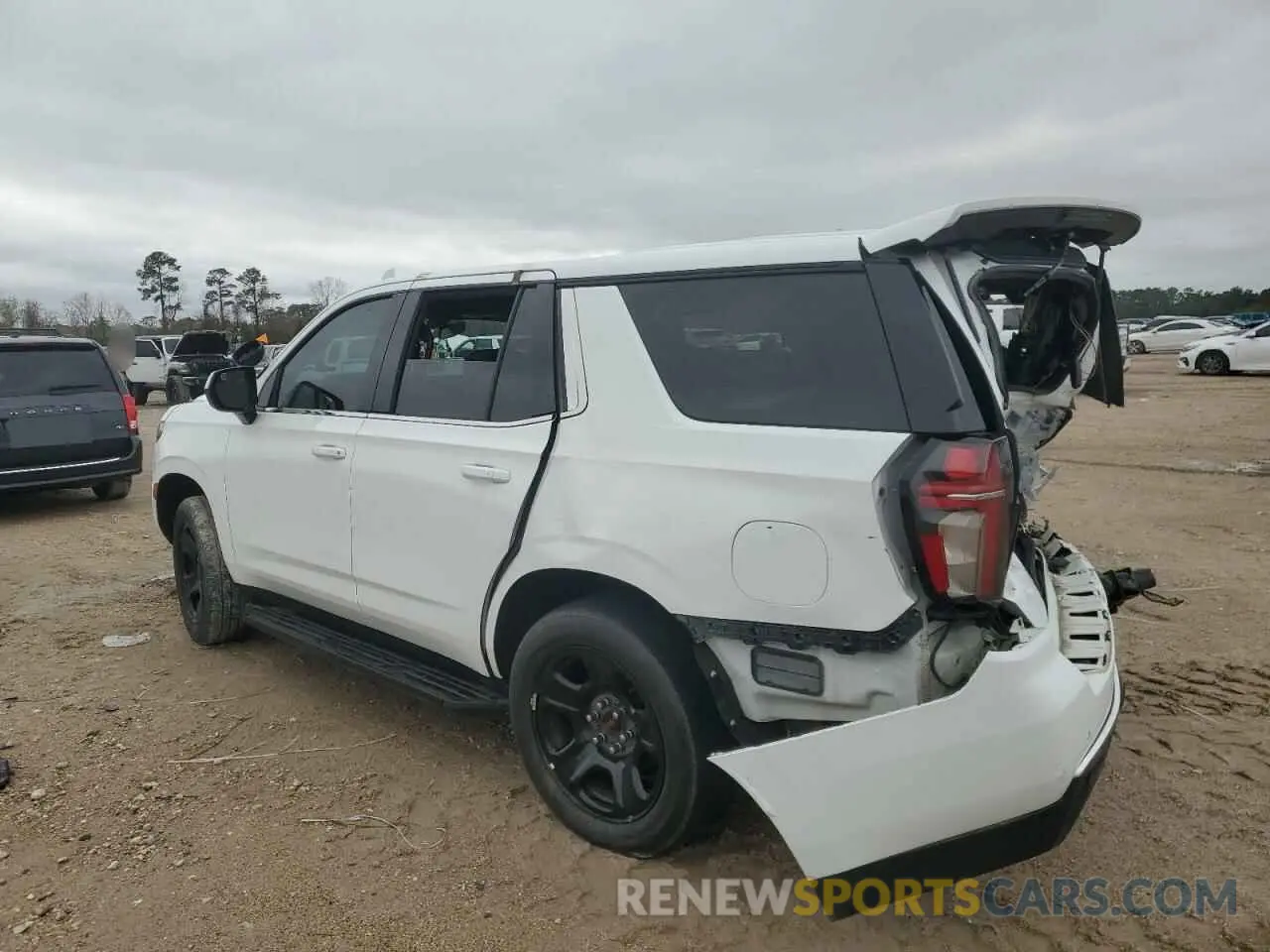 2 Photograph of a damaged car 1GNSCLED8MR467155 CHEVROLET TAHOE 2021