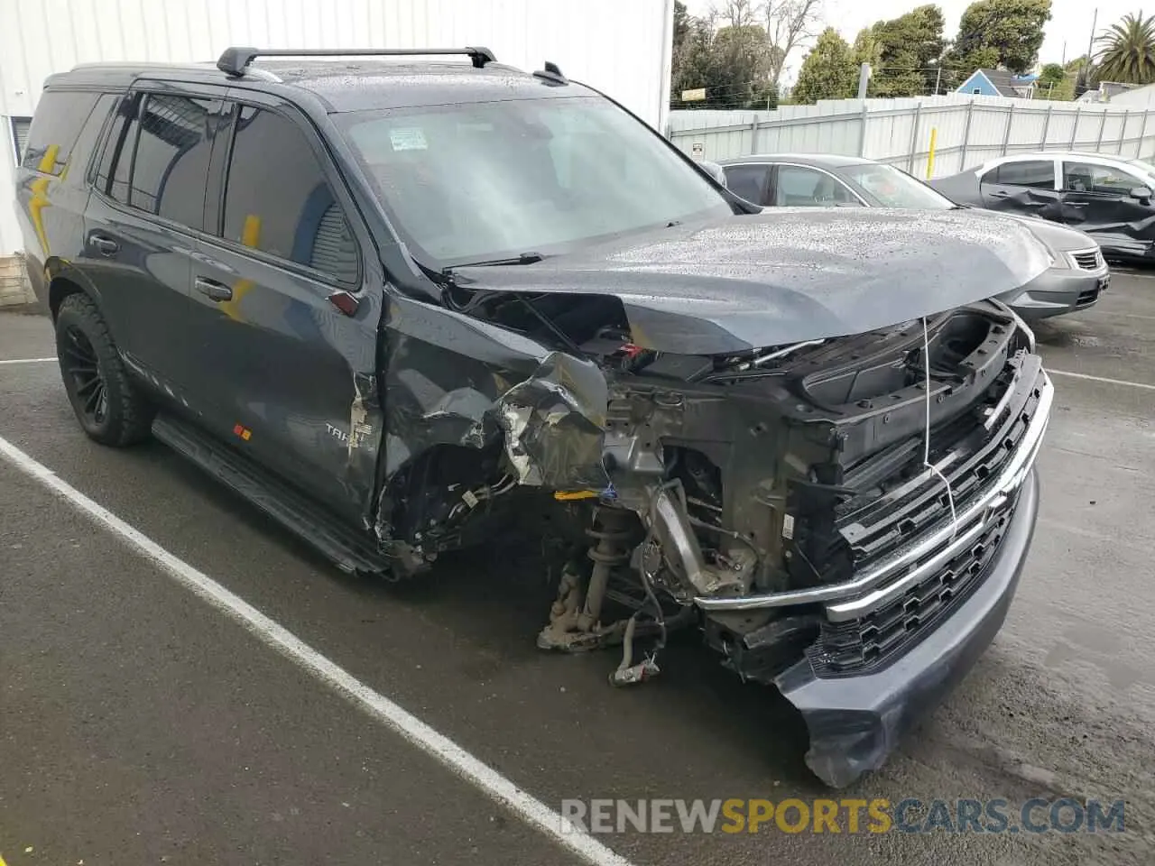 4 Photograph of a damaged car 1GNSCMKT1MR340734 CHEVROLET TAHOE 2021