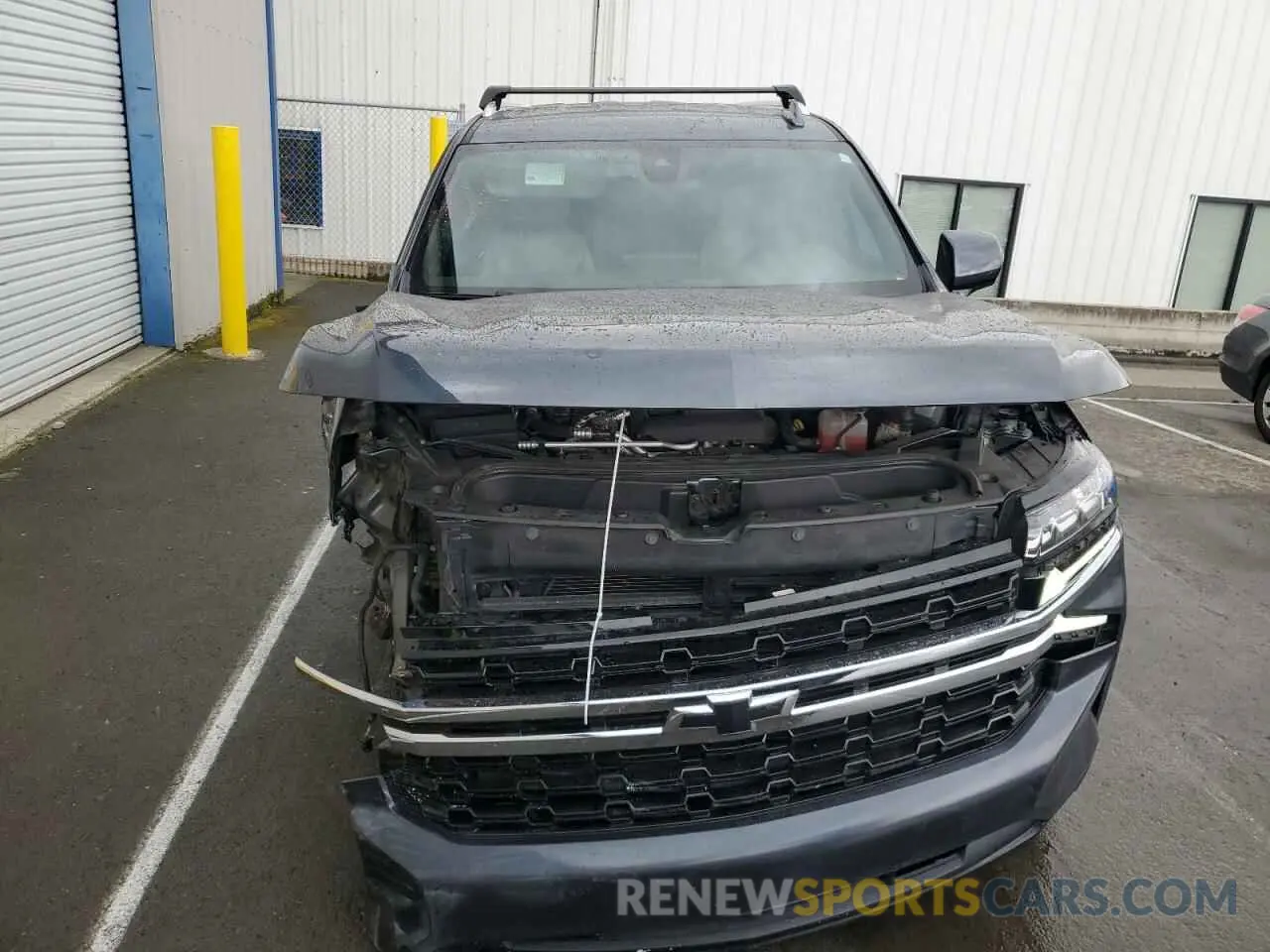 5 Photograph of a damaged car 1GNSCMKT1MR340734 CHEVROLET TAHOE 2021