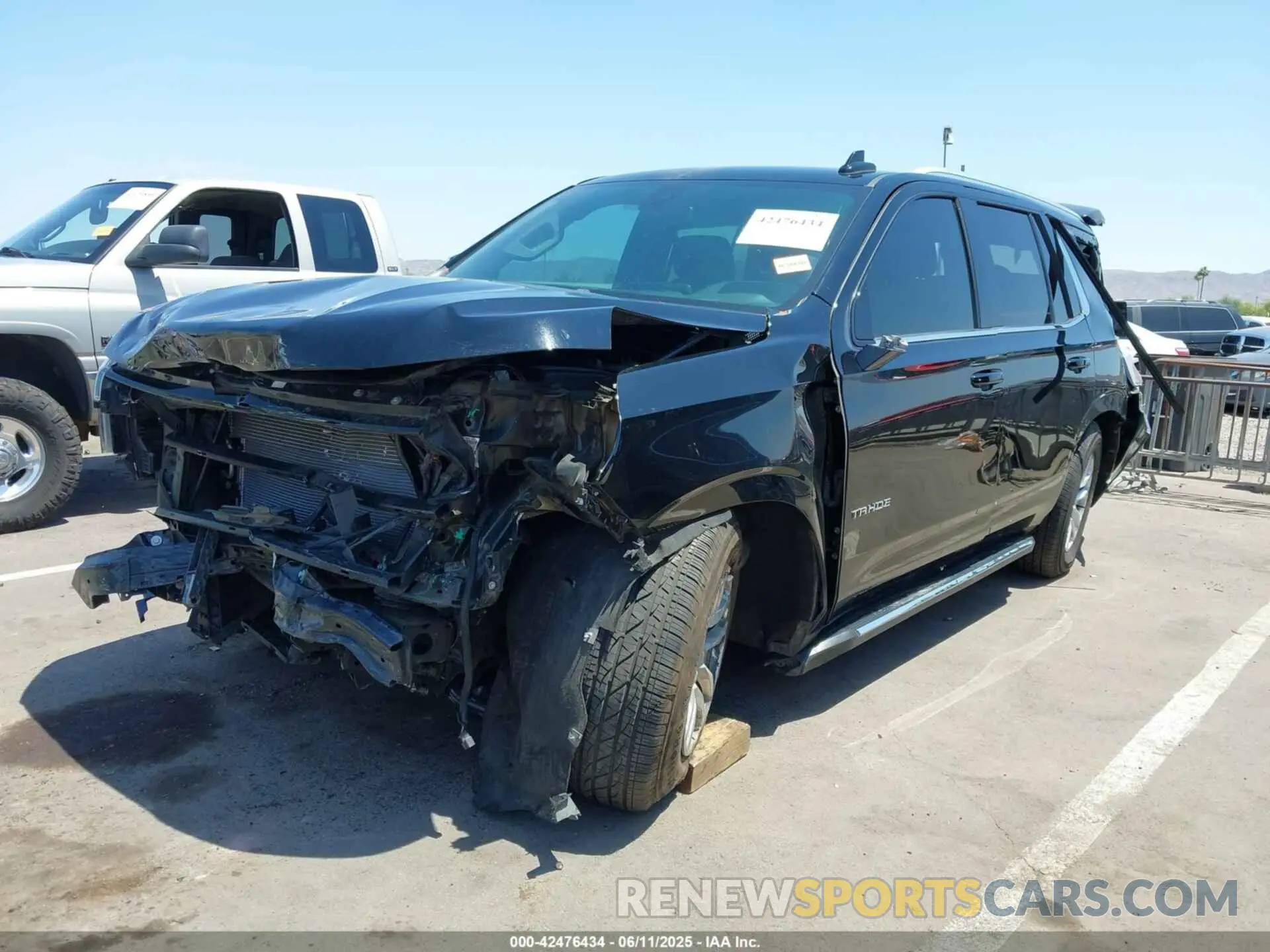 2 Photograph of a damaged car 1GNSCNKD5MR263476 CHEVROLET TAHOE 2021