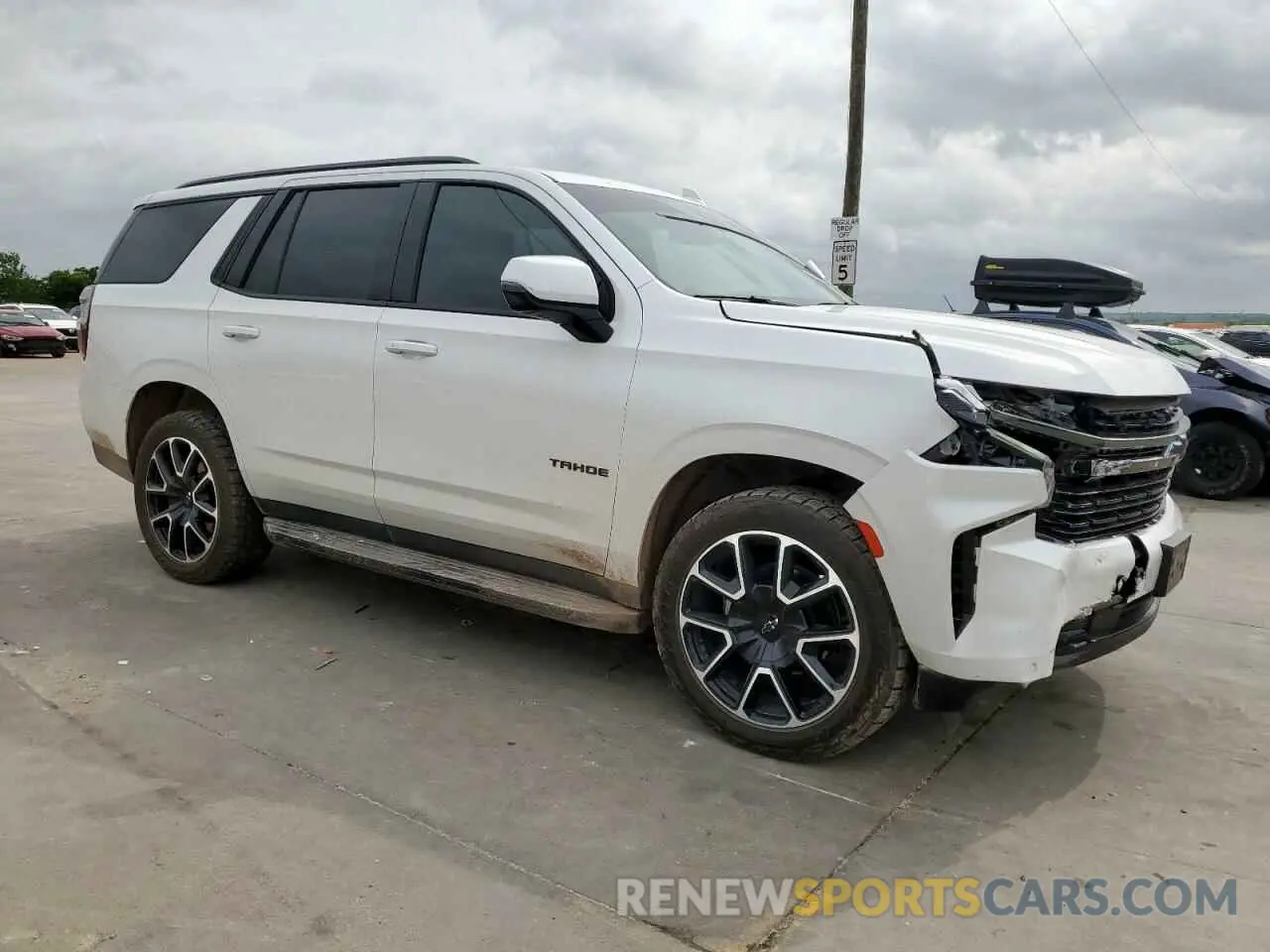 4 Photograph of a damaged car 1GNSCRKD2MR300815 CHEVROLET TAHOE 2021