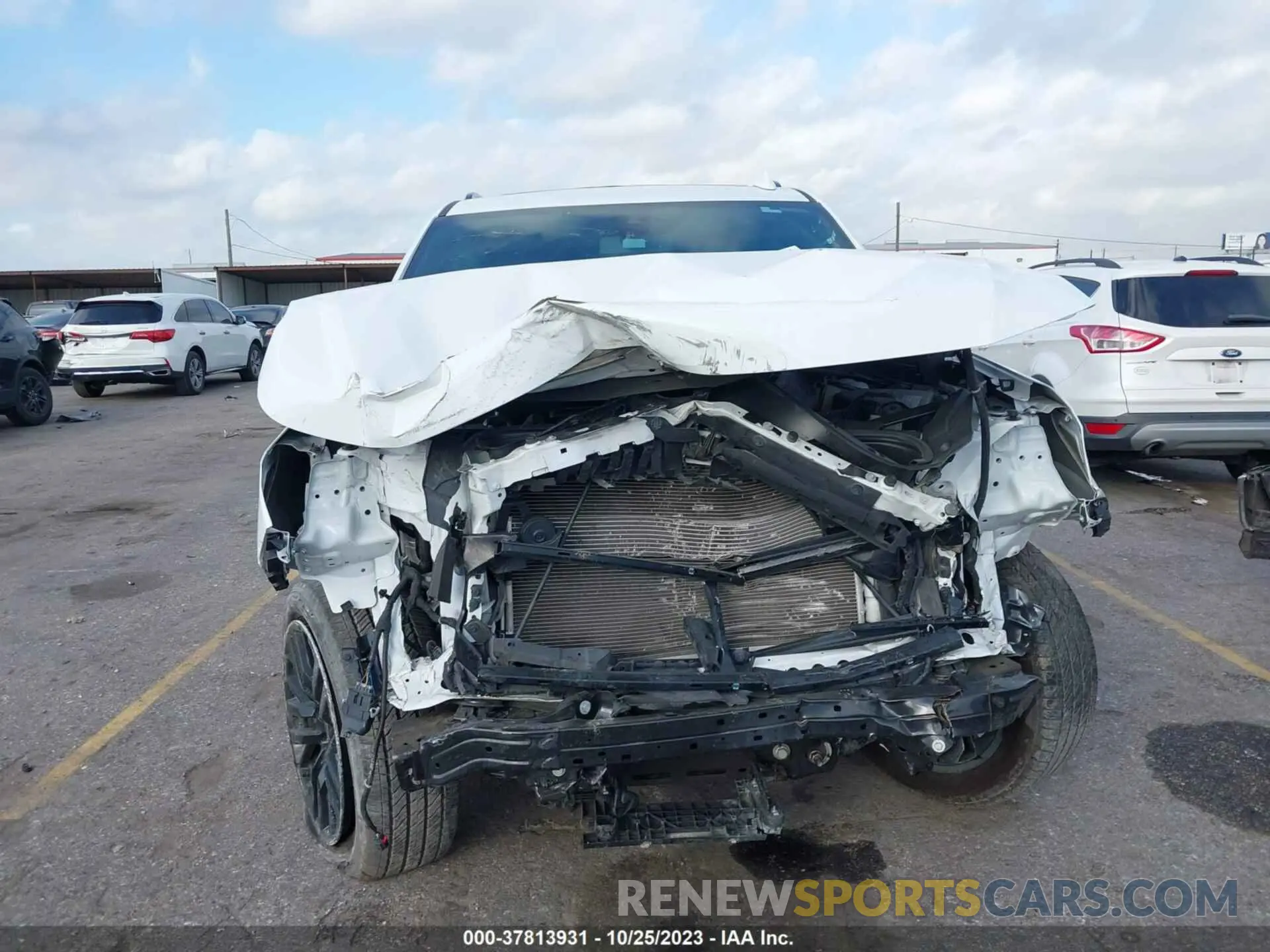 12 Photograph of a damaged car 1GNSCRKD9MR390089 CHEVROLET TAHOE 2021