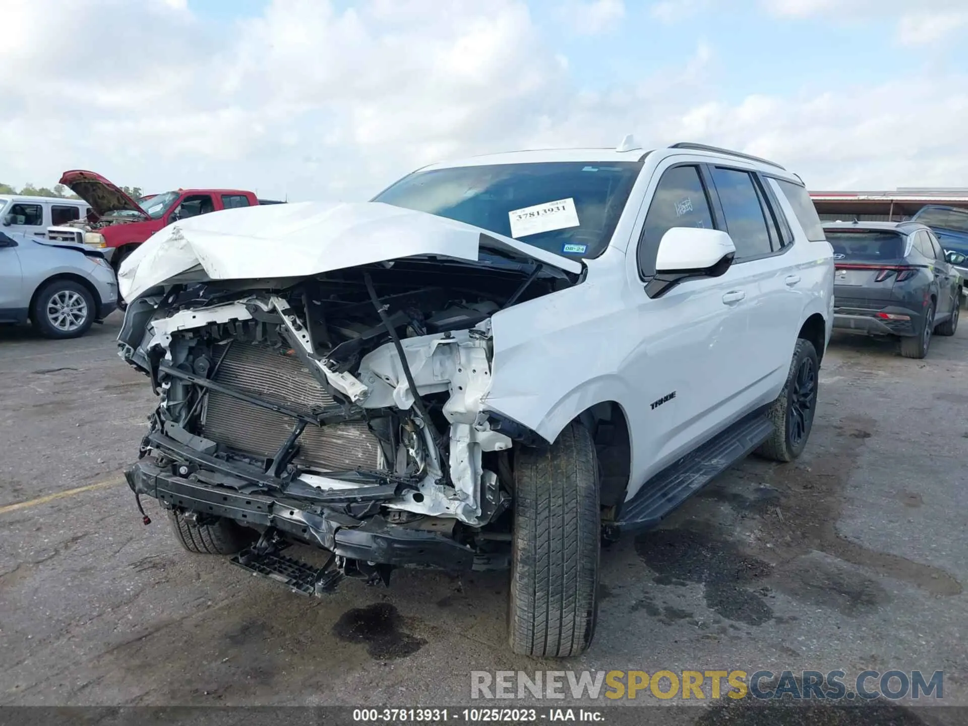 2 Photograph of a damaged car 1GNSCRKD9MR390089 CHEVROLET TAHOE 2021