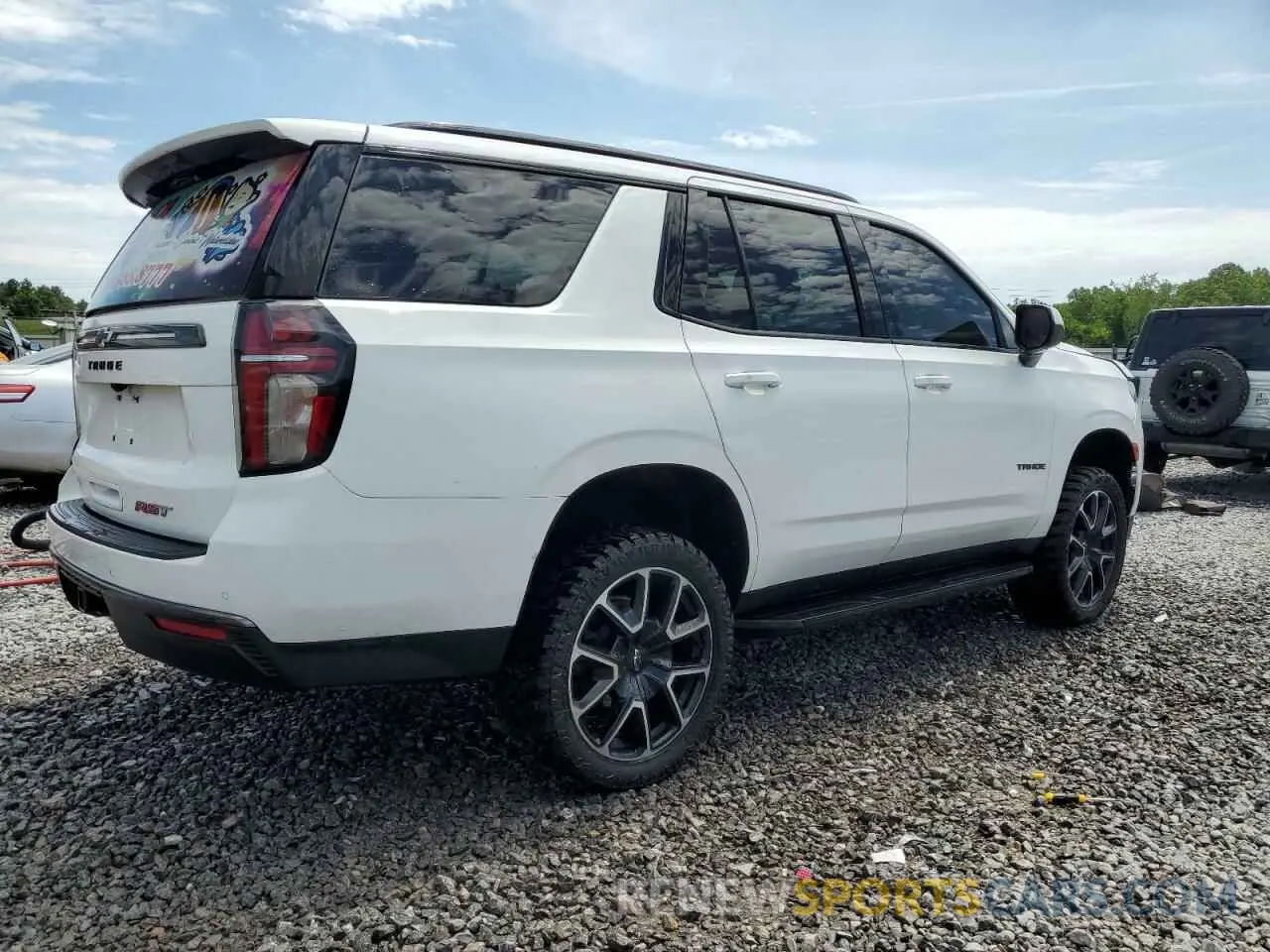 3 Photograph of a damaged car 1GNSCRKD9MR395972 CHEVROLET TAHOE 2021