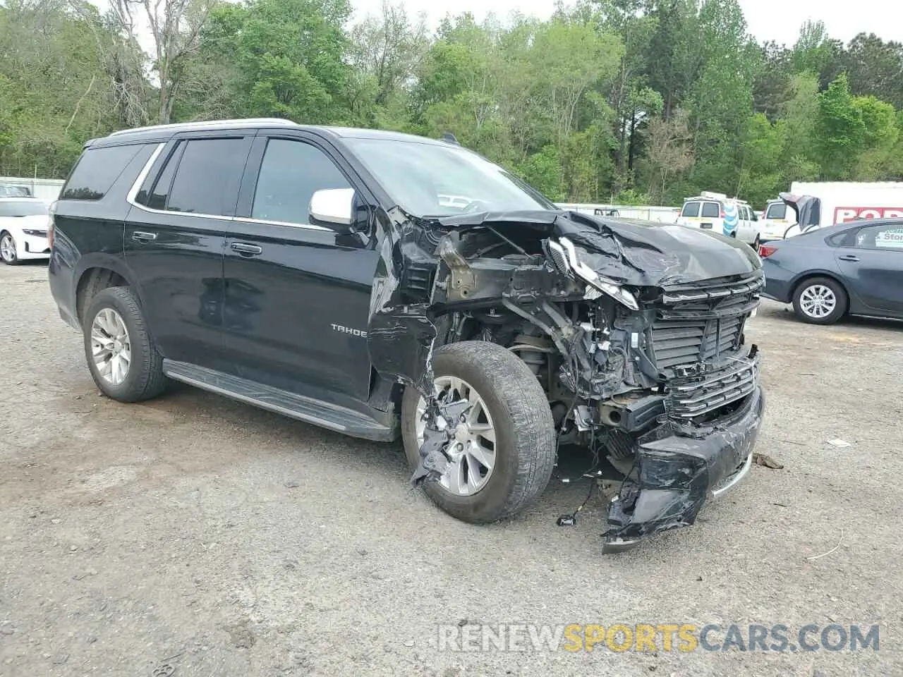 4 Photograph of a damaged car 1GNSCSKD1MR104260 CHEVROLET TAHOE 2021