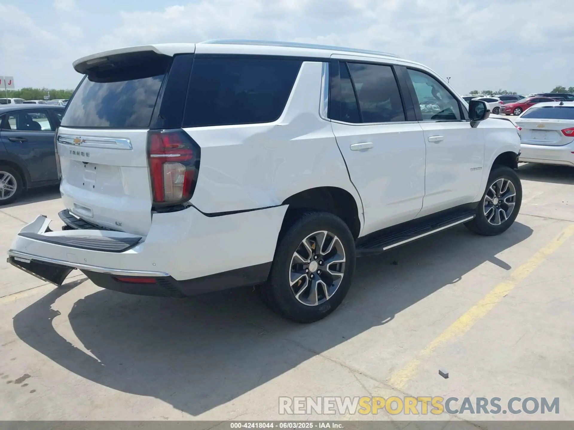 4 Photograph of a damaged car 1GNSKNKD0MR488813 CHEVROLET TAHOE 2021