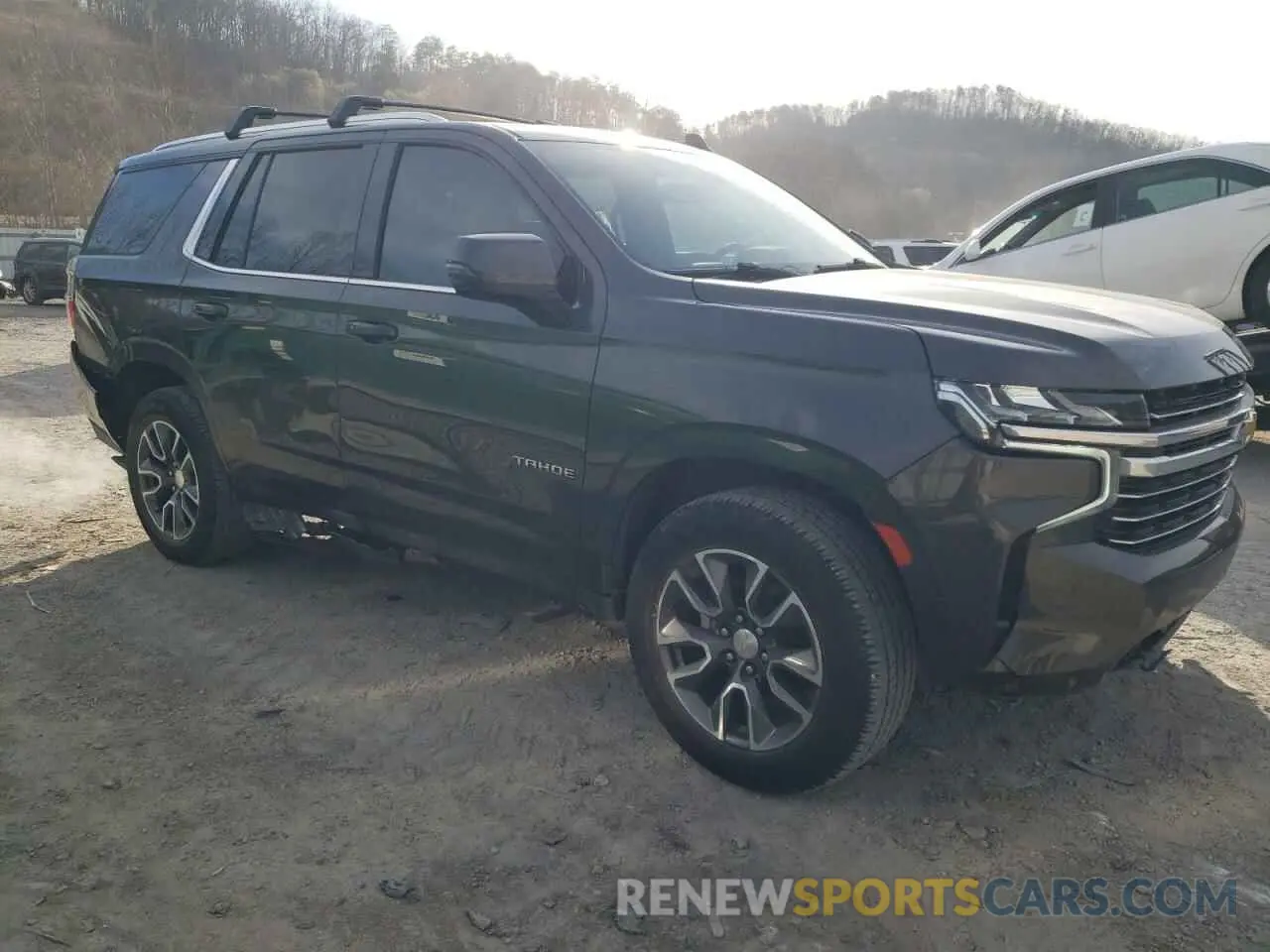 4 Photograph of a damaged car 1GNSKNKD1MR103887 CHEVROLET TAHOE 2021