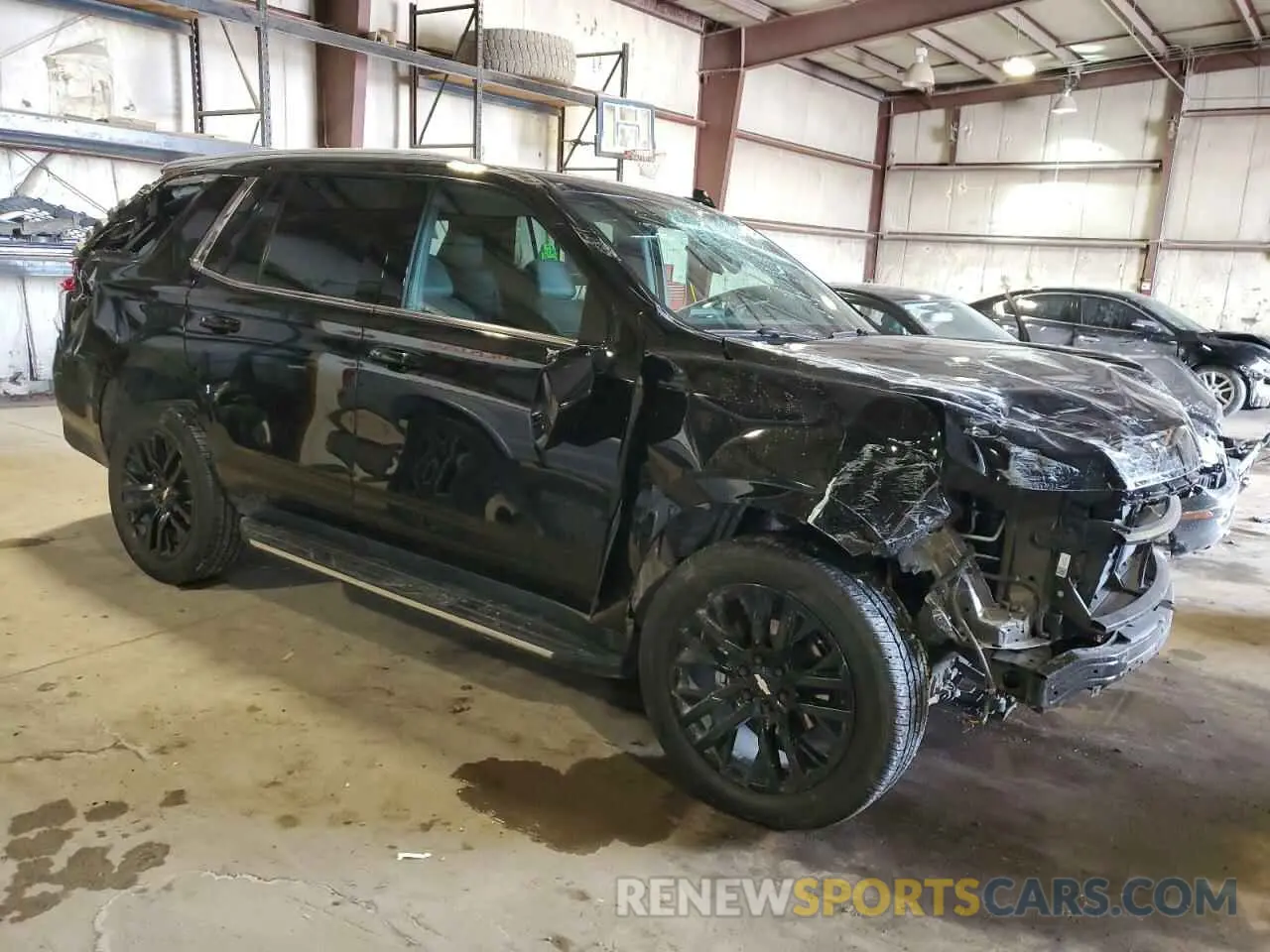 4 Photograph of a damaged car 1GNSKNKD8MR394503 CHEVROLET TAHOE 2021