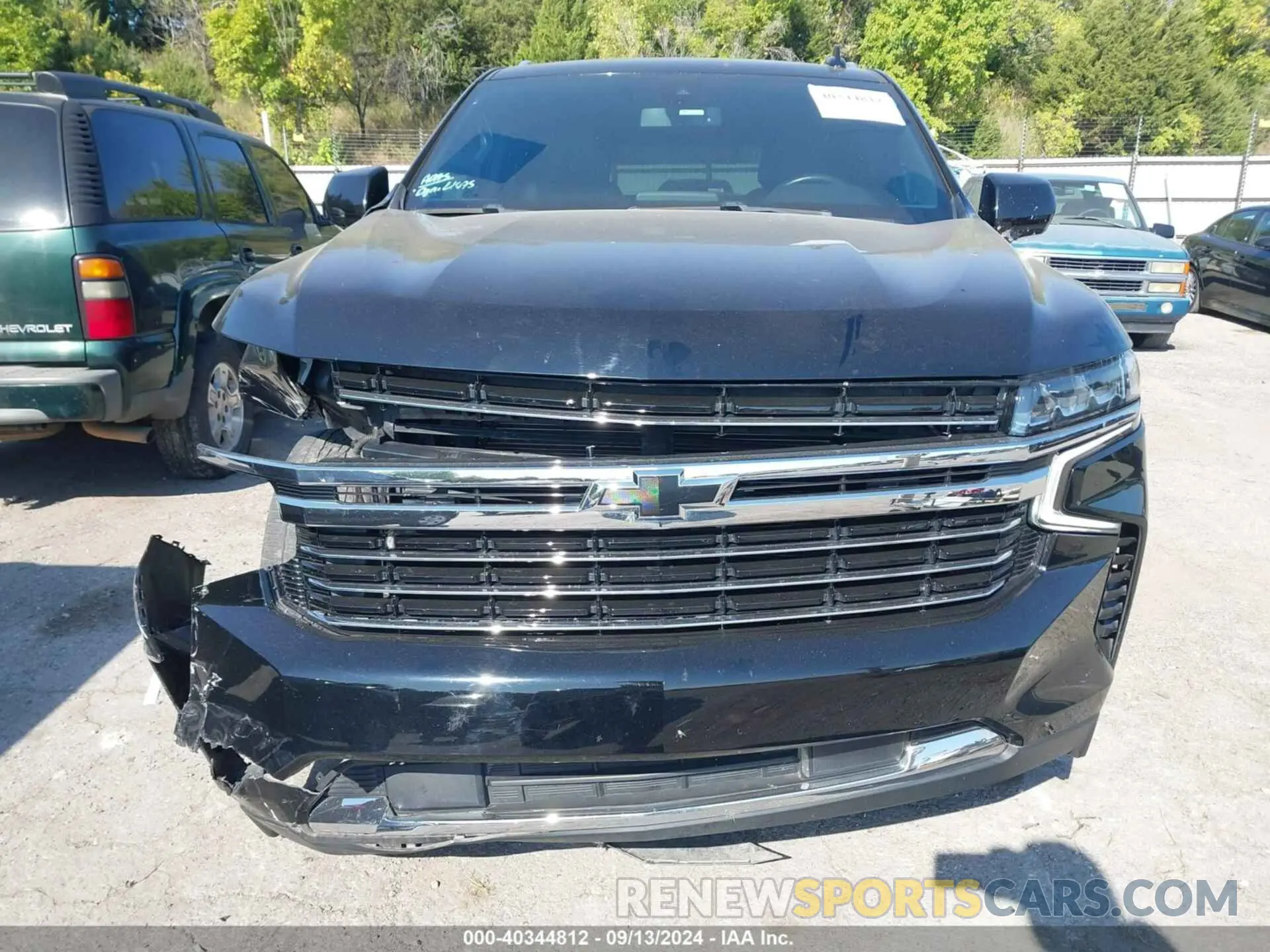 13 Photograph of a damaged car 1GNSKNKD8MR485559 CHEVROLET TAHOE 2021