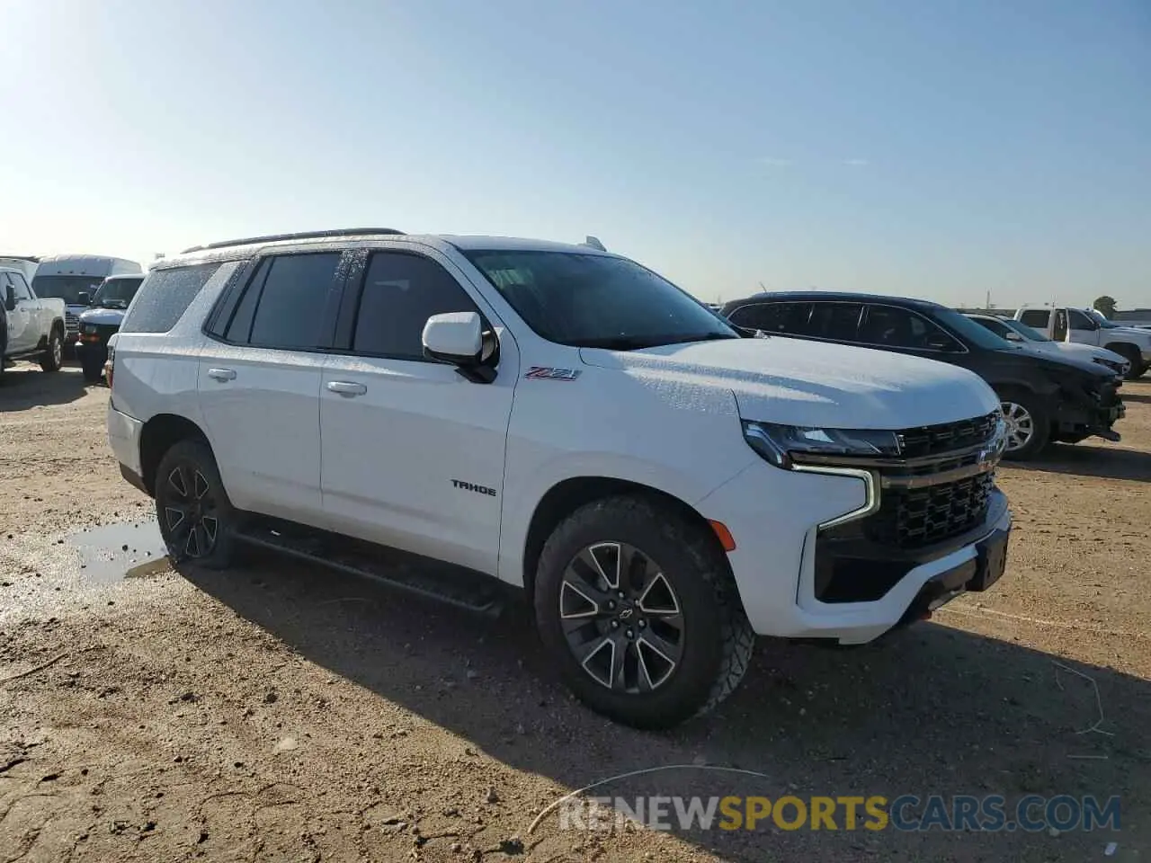 4 Photograph of a damaged car 1GNSKPKD3MR226425 CHEVROLET TAHOE 2021