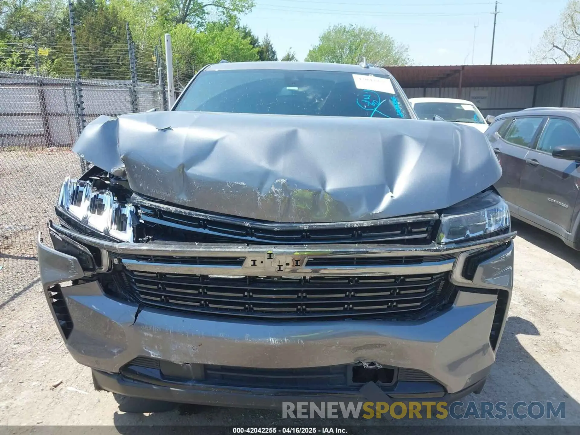 12 Photograph of a damaged car 1GNSKRKD1MR334280 CHEVROLET TAHOE 2021
