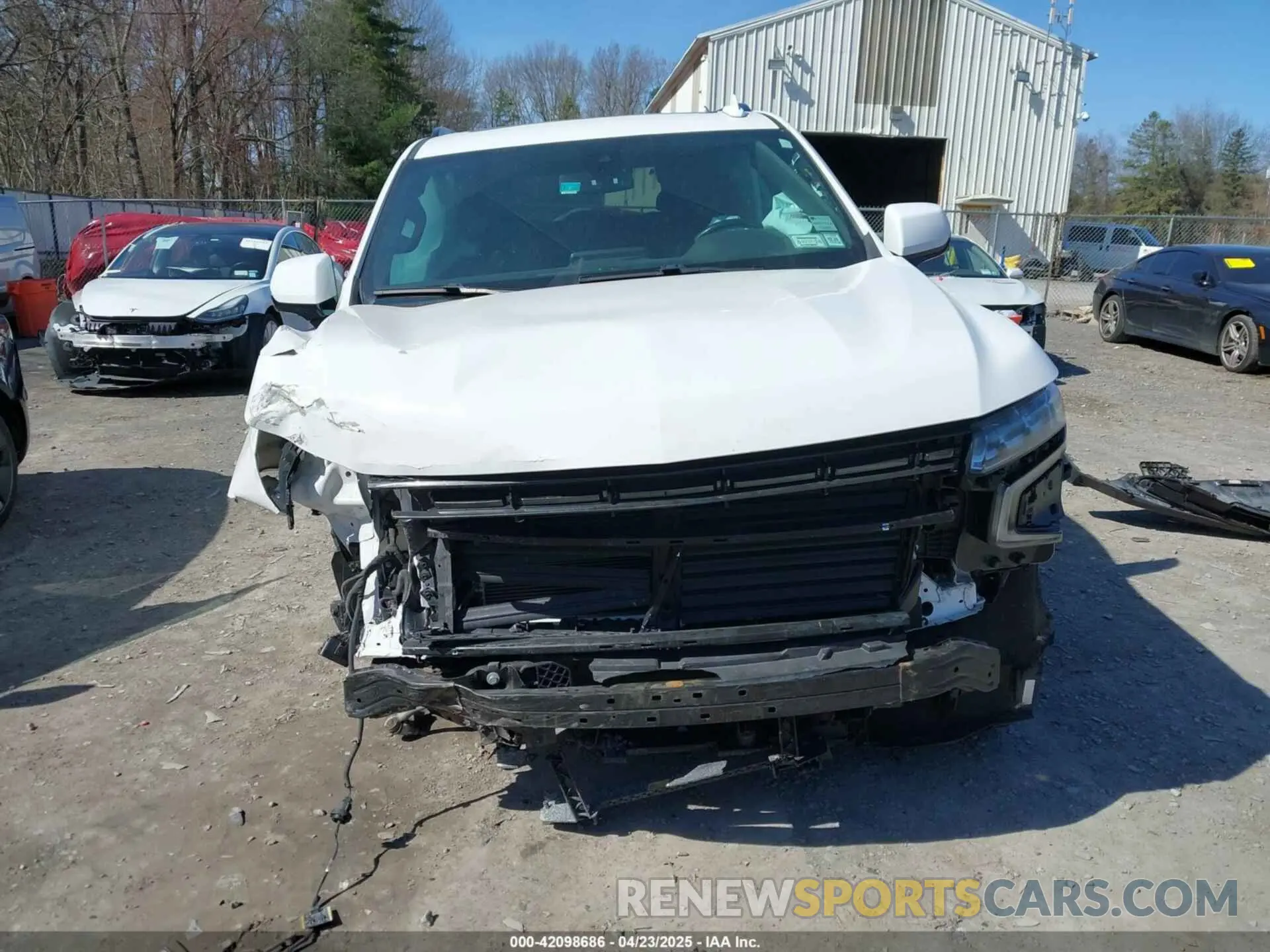 12 Photograph of a damaged car 1GNSKRKD6MR306510 CHEVROLET TAHOE 2021