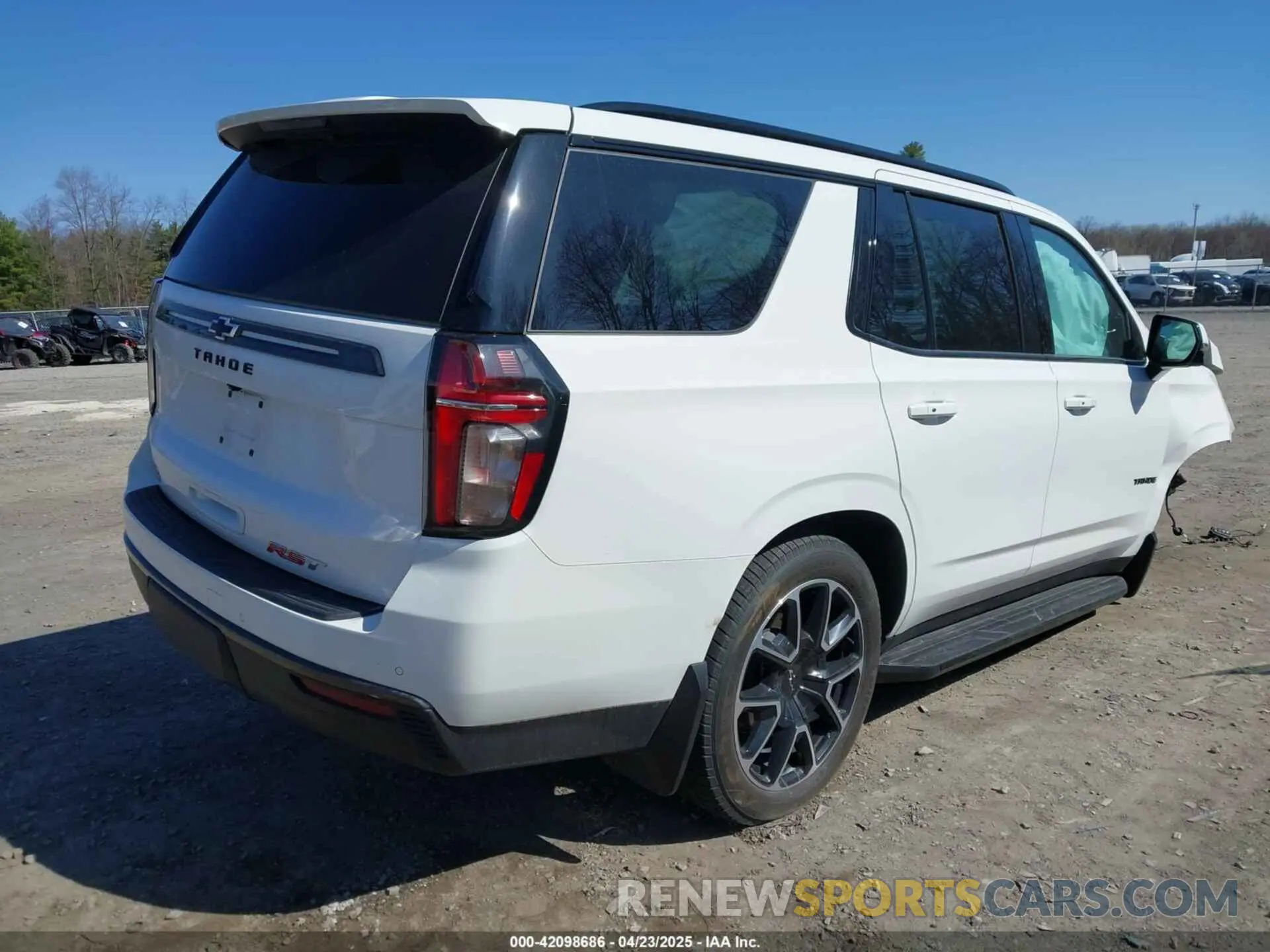 4 Photograph of a damaged car 1GNSKRKD6MR306510 CHEVROLET TAHOE 2021