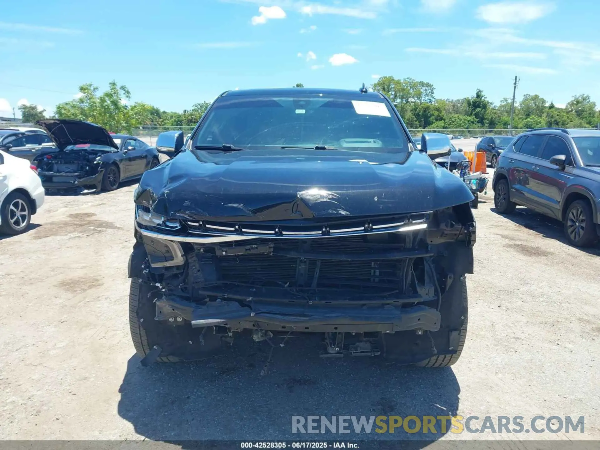 13 Photograph of a damaged car 1GNSKSKDXMR195984 CHEVROLET TAHOE 2021