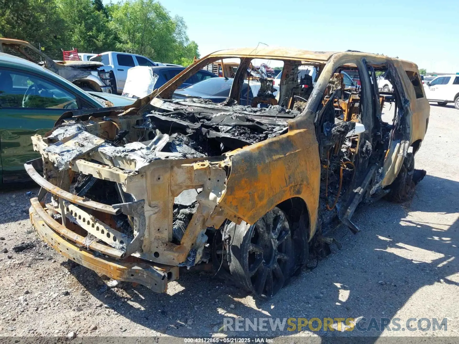 2 Photograph of a damaged car 1GNSKTKL3MR428889 CHEVROLET TAHOE 2021