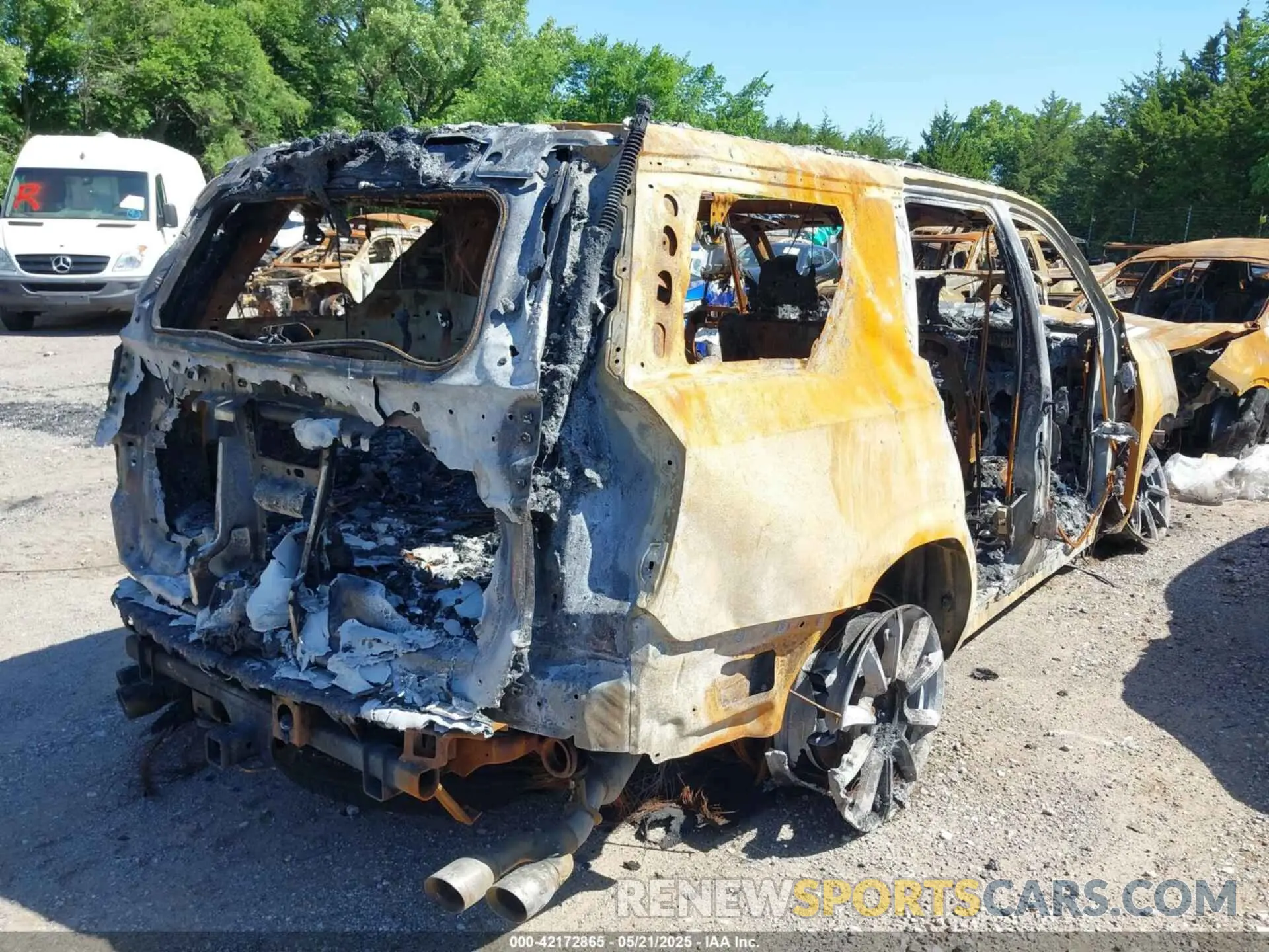 4 Photograph of a damaged car 1GNSKTKL3MR428889 CHEVROLET TAHOE 2021