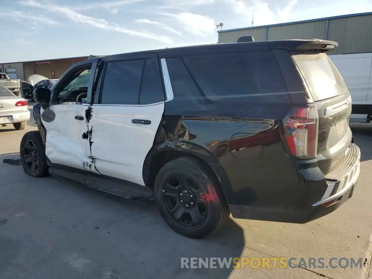 2 Photograph of a damaged car 1GNSCLED1NR218049 CHEVROLET TAHOE 2022
