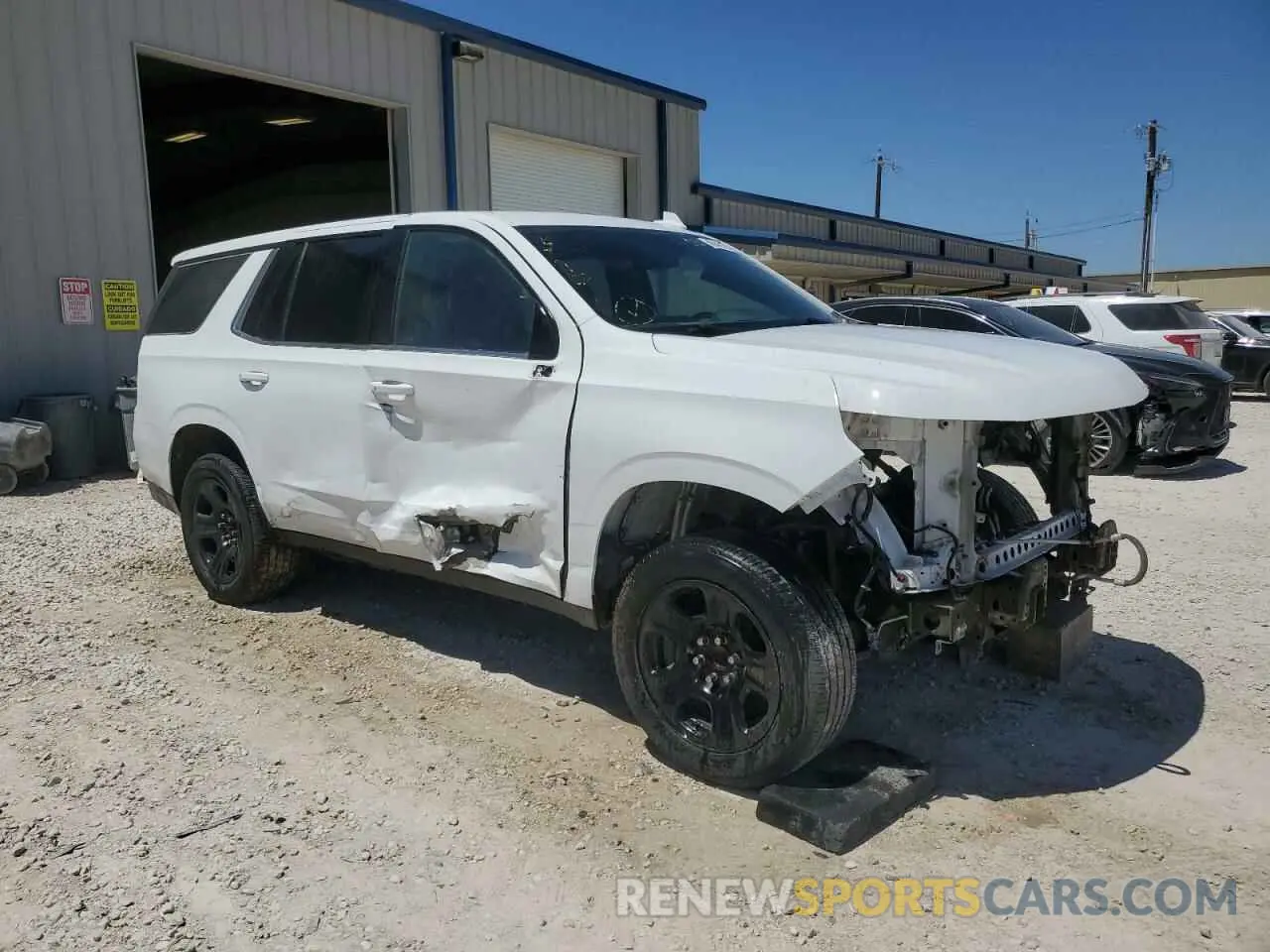 4 Photograph of a damaged car 1GNSCLED8NR247807 CHEVROLET TAHOE 2022