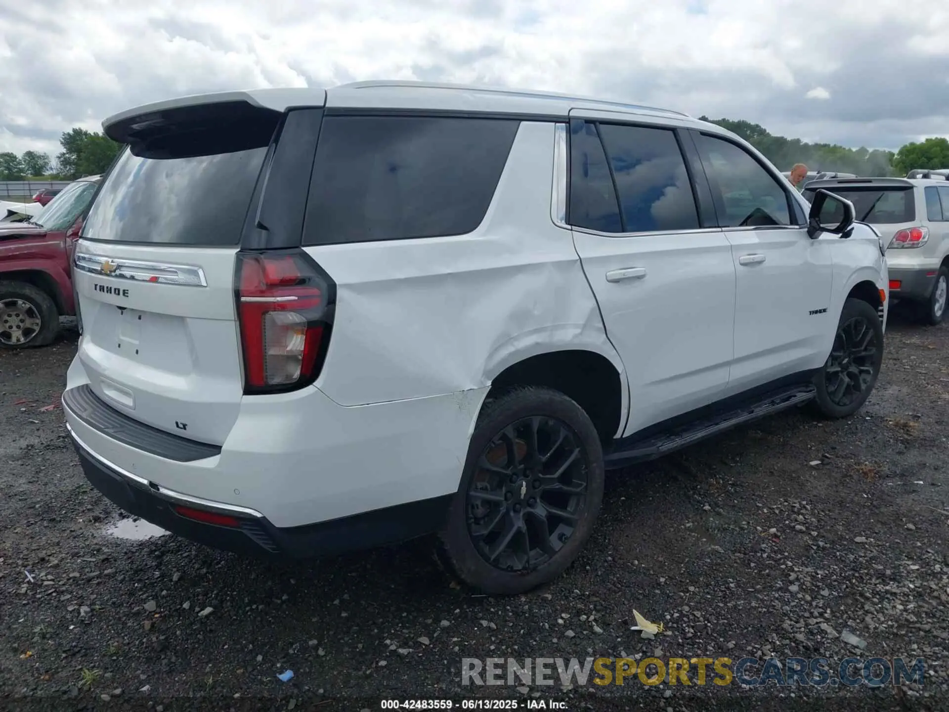 4 Photograph of a damaged car 1GNSKNKD3NR325364 CHEVROLET TAHOE 2022