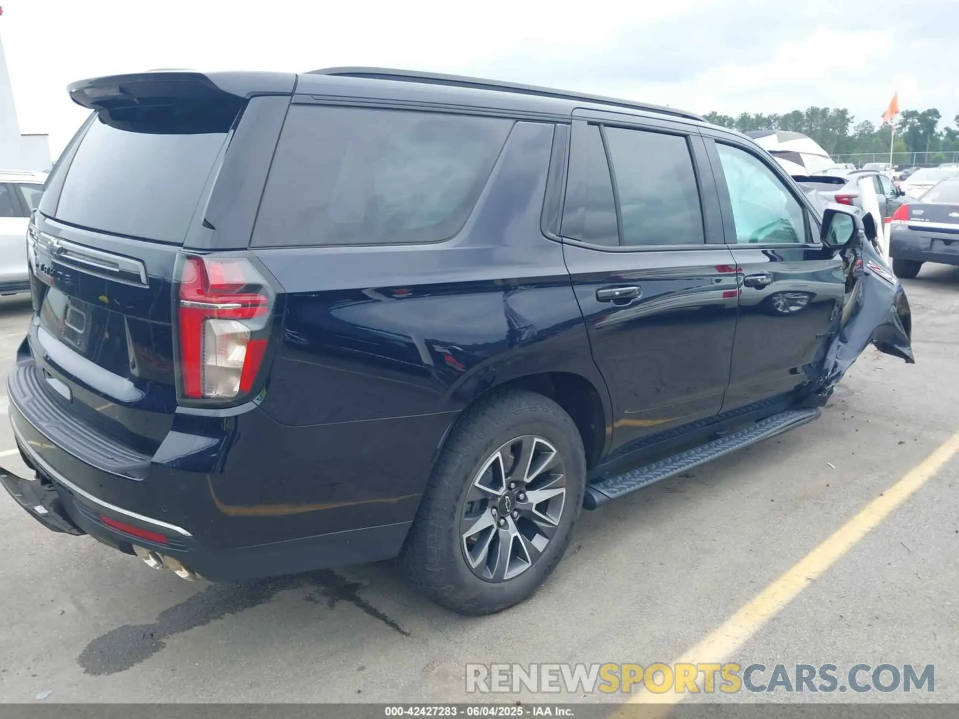 4 Photograph of a damaged car 1GNSKPKL2NR225842 CHEVROLET TAHOE 2022