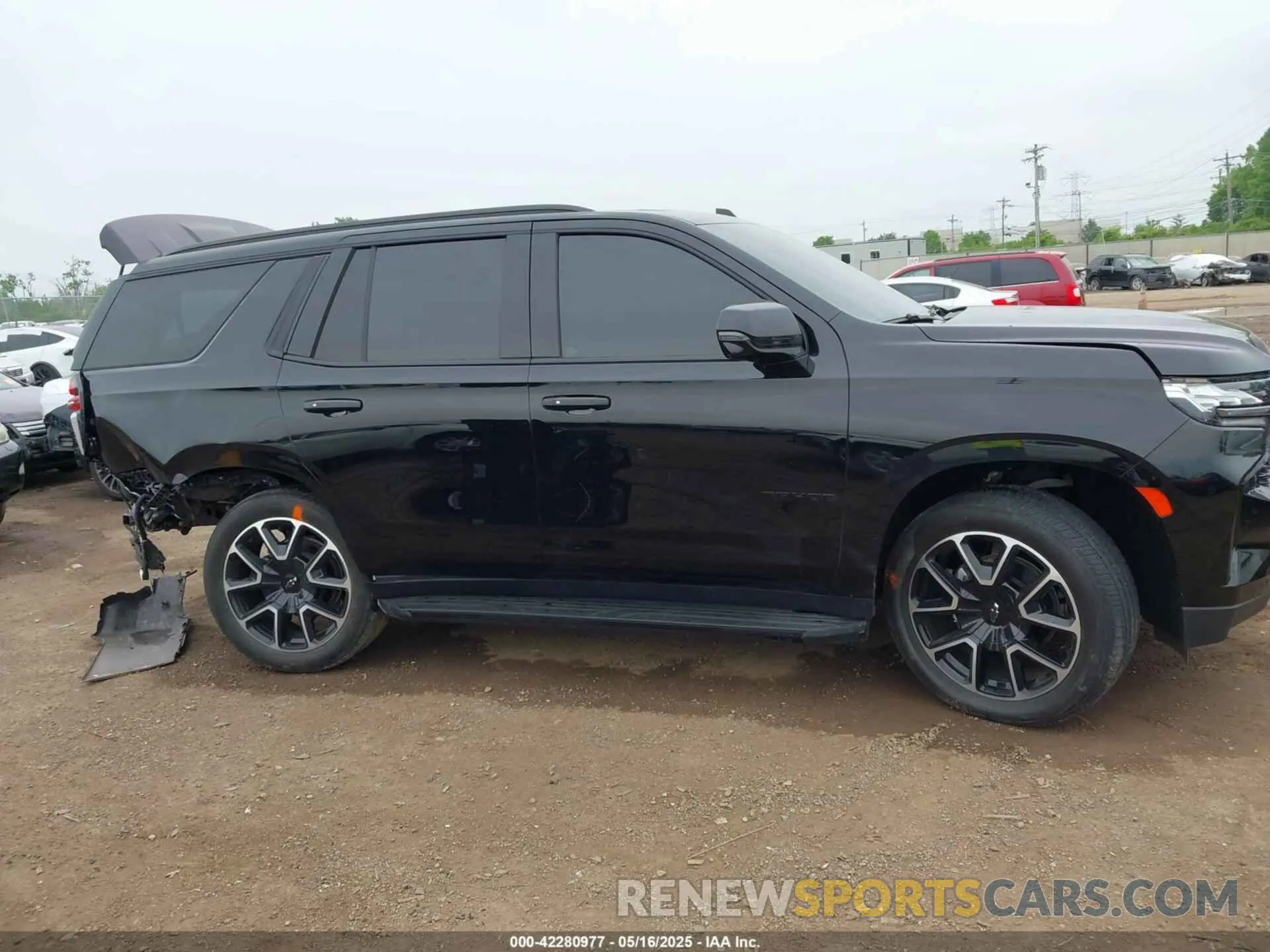 13 Photograph of a damaged car 1GNSKRKD0NR193459 CHEVROLET TAHOE 2022