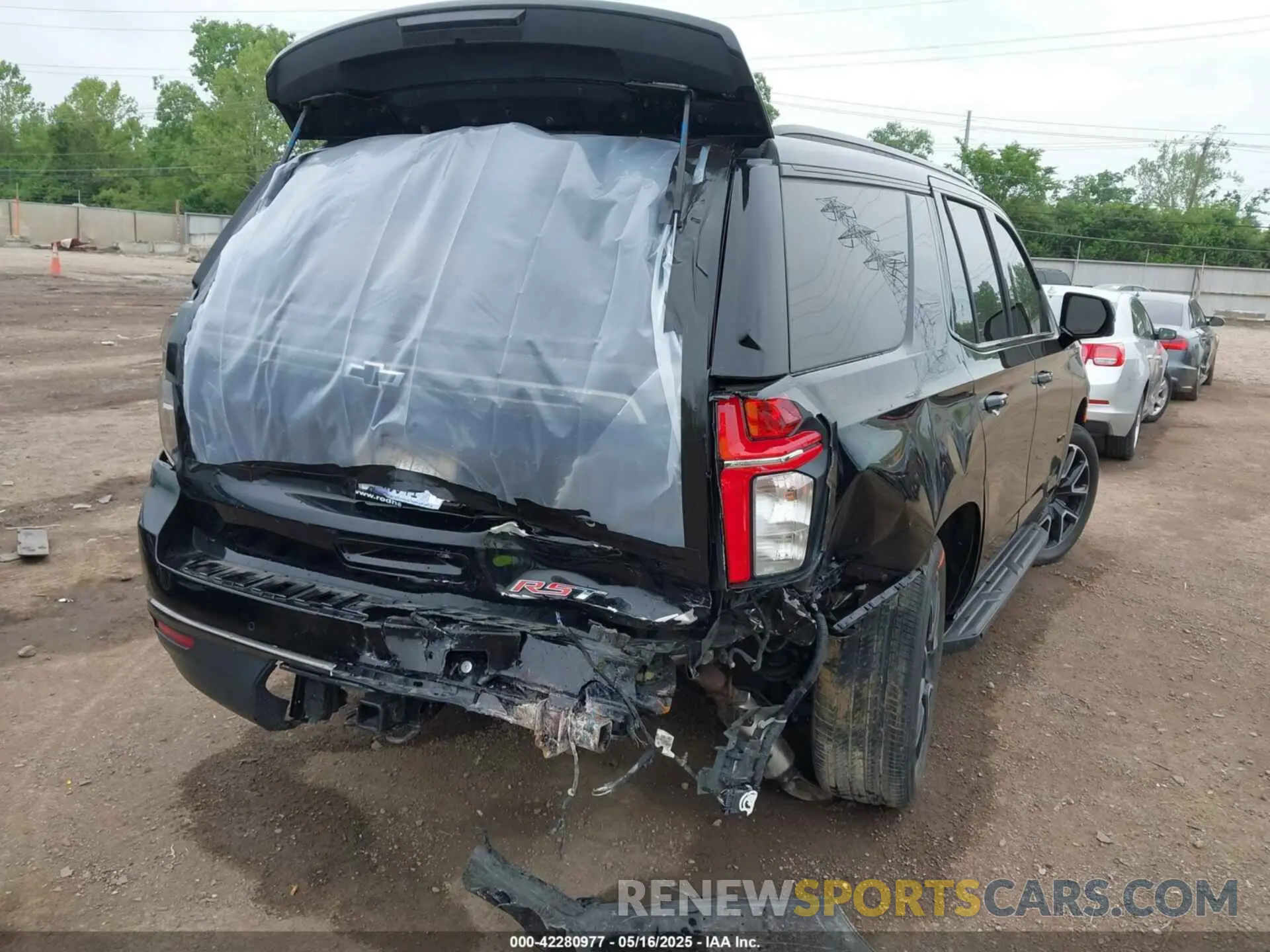 4 Photograph of a damaged car 1GNSKRKD0NR193459 CHEVROLET TAHOE 2022