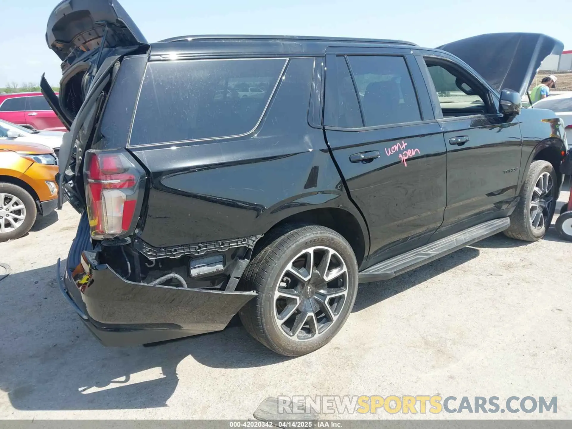 4 Photograph of a damaged car 1GNSKRKT7NR228974 CHEVROLET TAHOE 2022