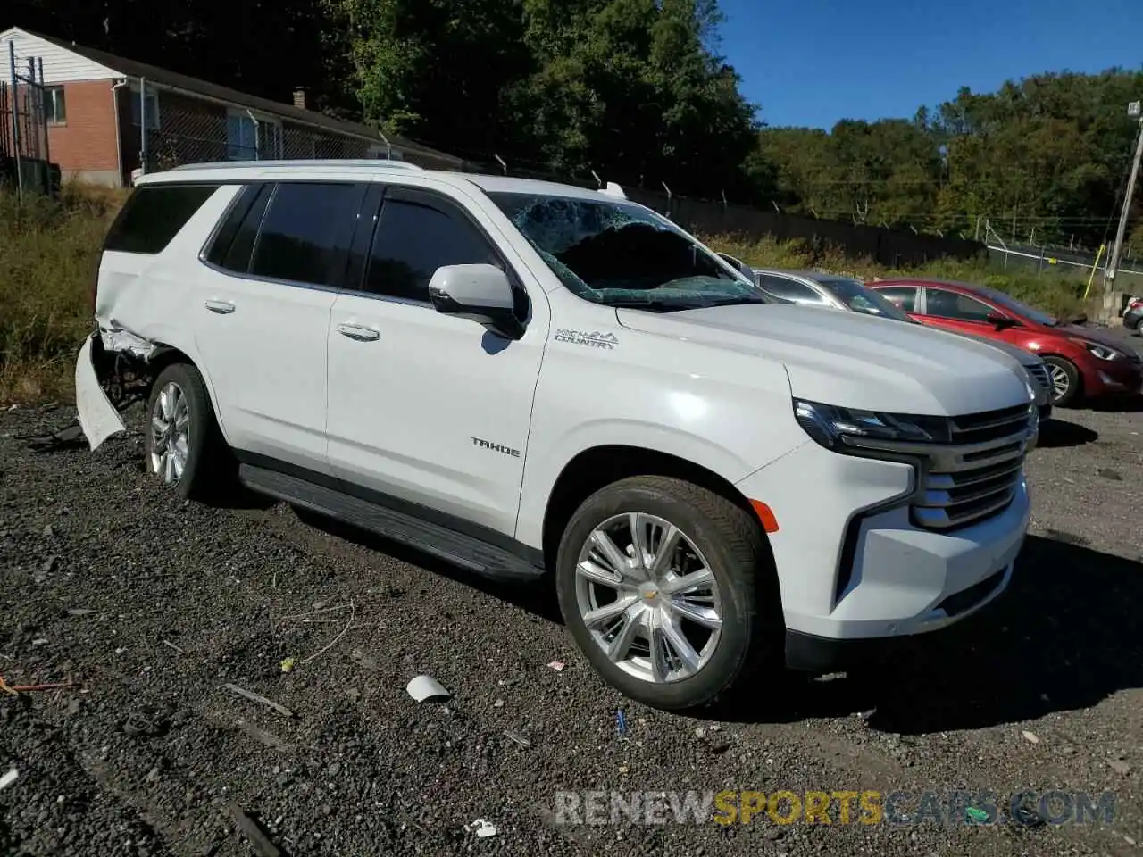 4 Photograph of a damaged car 1GNSKTKL1NR313709 CHEVROLET TAHOE 2022