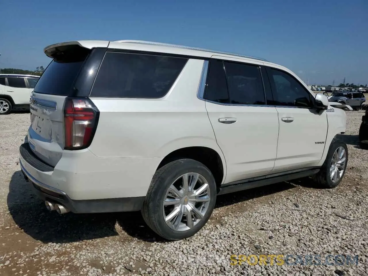 3 Photograph of a damaged car 1GNSKTKL5NR186348 CHEVROLET TAHOE 2022