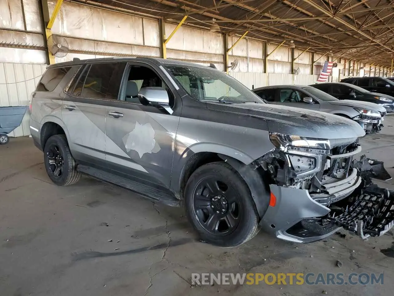4 Photograph of a damaged car 1GNSCLED5PR133377 CHEVROLET TAHOE 2023