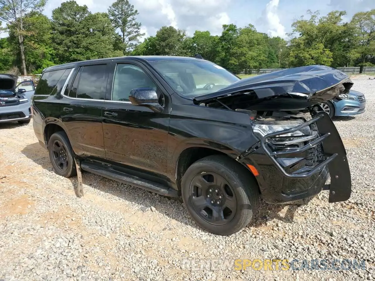 4 Photograph of a damaged car 1GNSCLED9PR406353 CHEVROLET TAHOE 2023