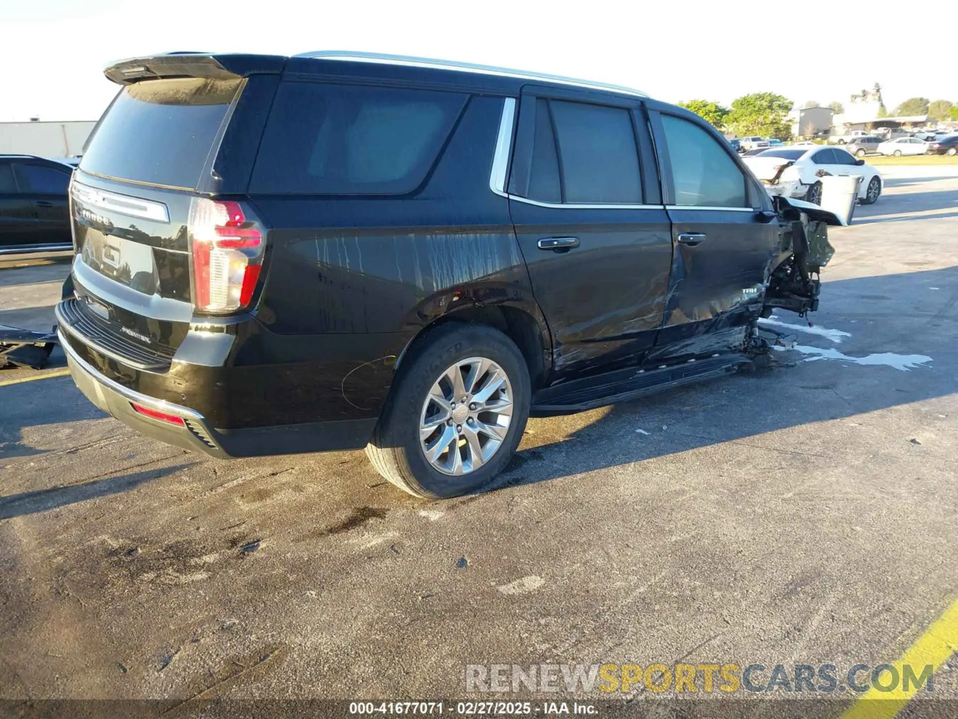 4 Photograph of a damaged car 1GNSCSKTXPR323861 CHEVROLET TAHOE 2023