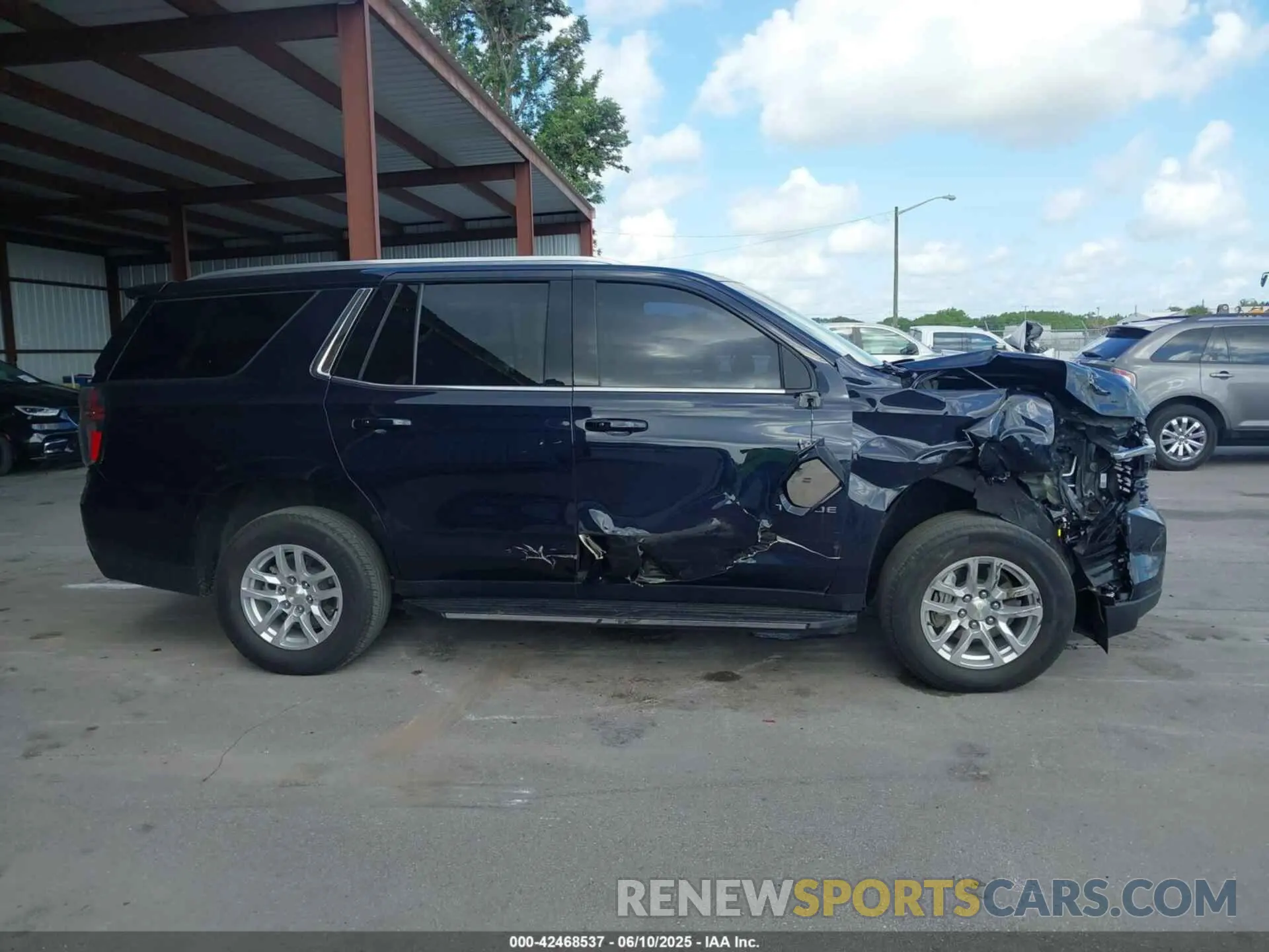 13 Photograph of a damaged car 1GNSKNKD6PR198449 CHEVROLET TAHOE 2023