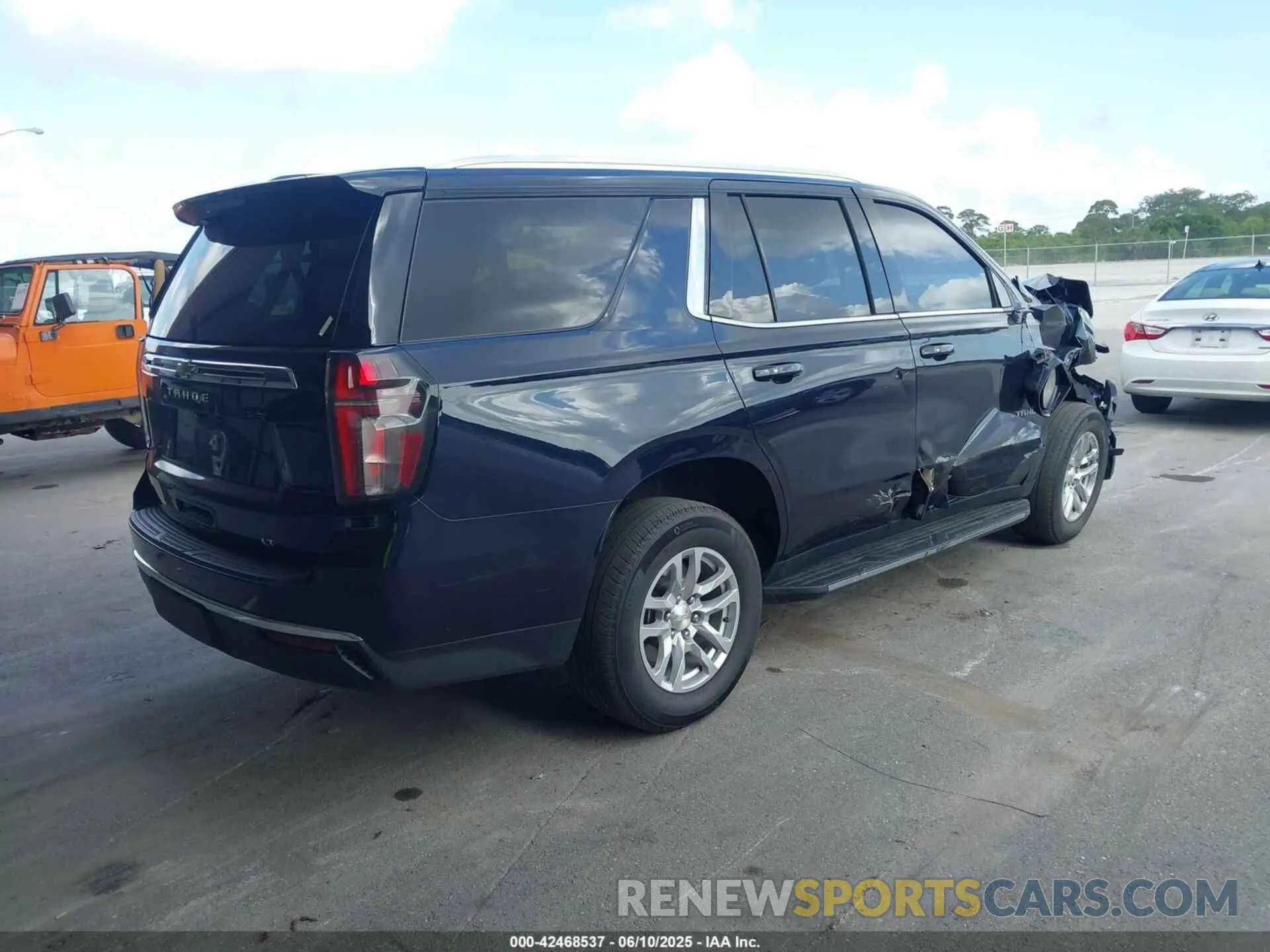 4 Photograph of a damaged car 1GNSKNKD6PR198449 CHEVROLET TAHOE 2023