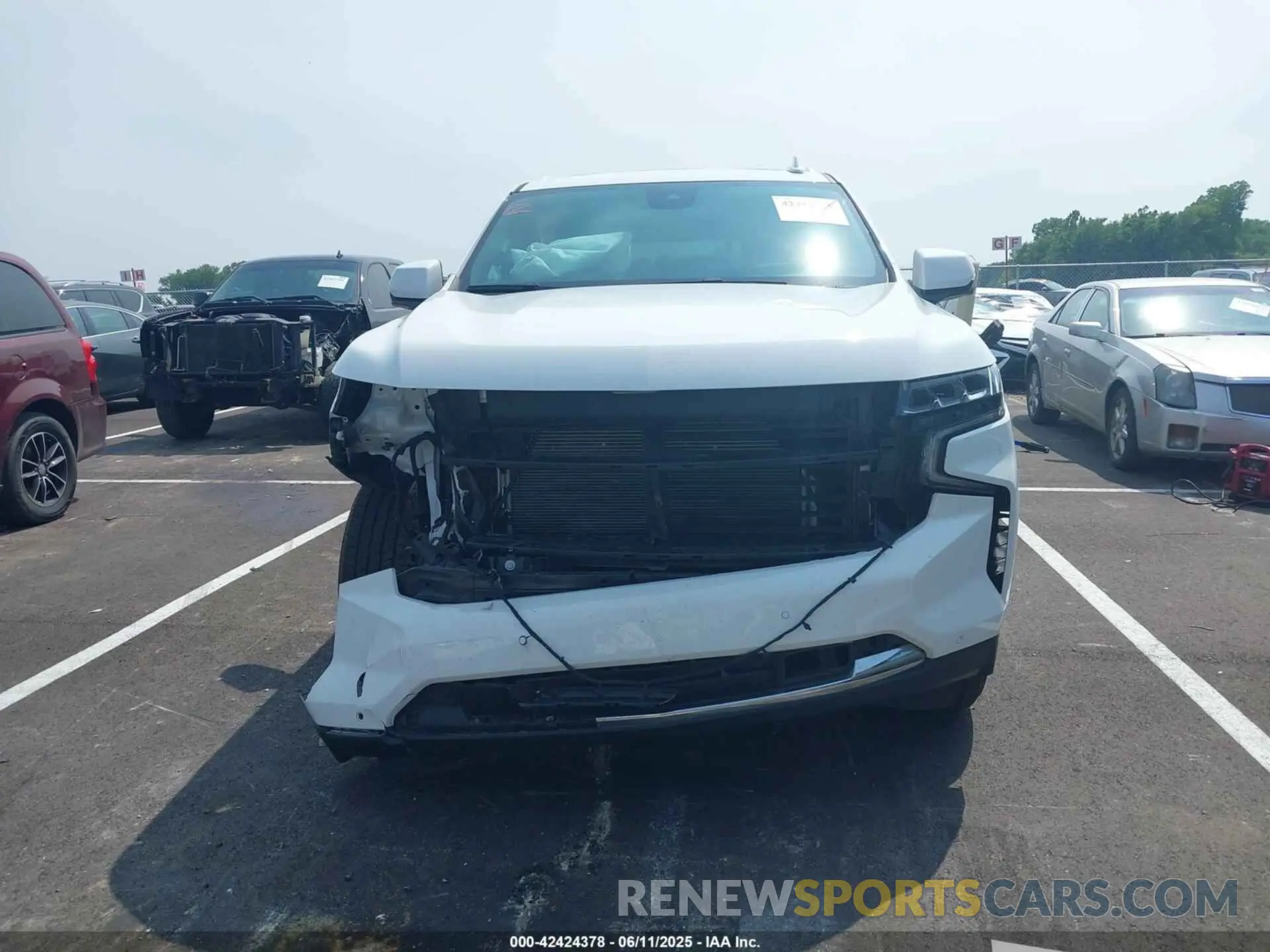 12 Photograph of a damaged car 1GNSKNKD6PR468151 CHEVROLET TAHOE 2023