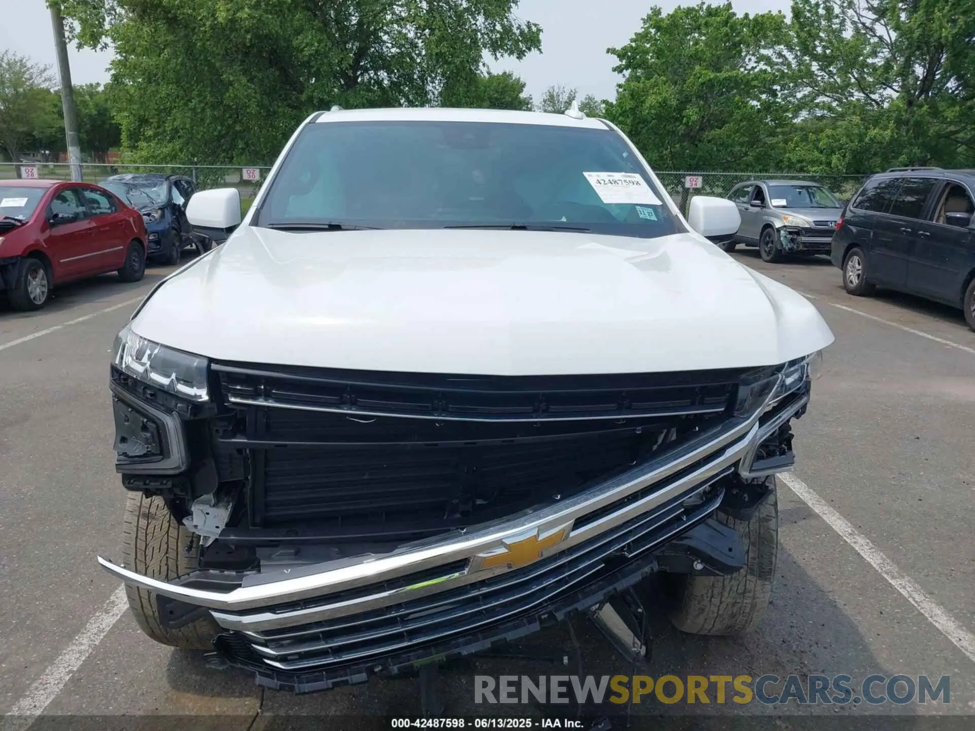 11 Photograph of a damaged car 1GNSKNKD7PR119905 CHEVROLET TAHOE 2023