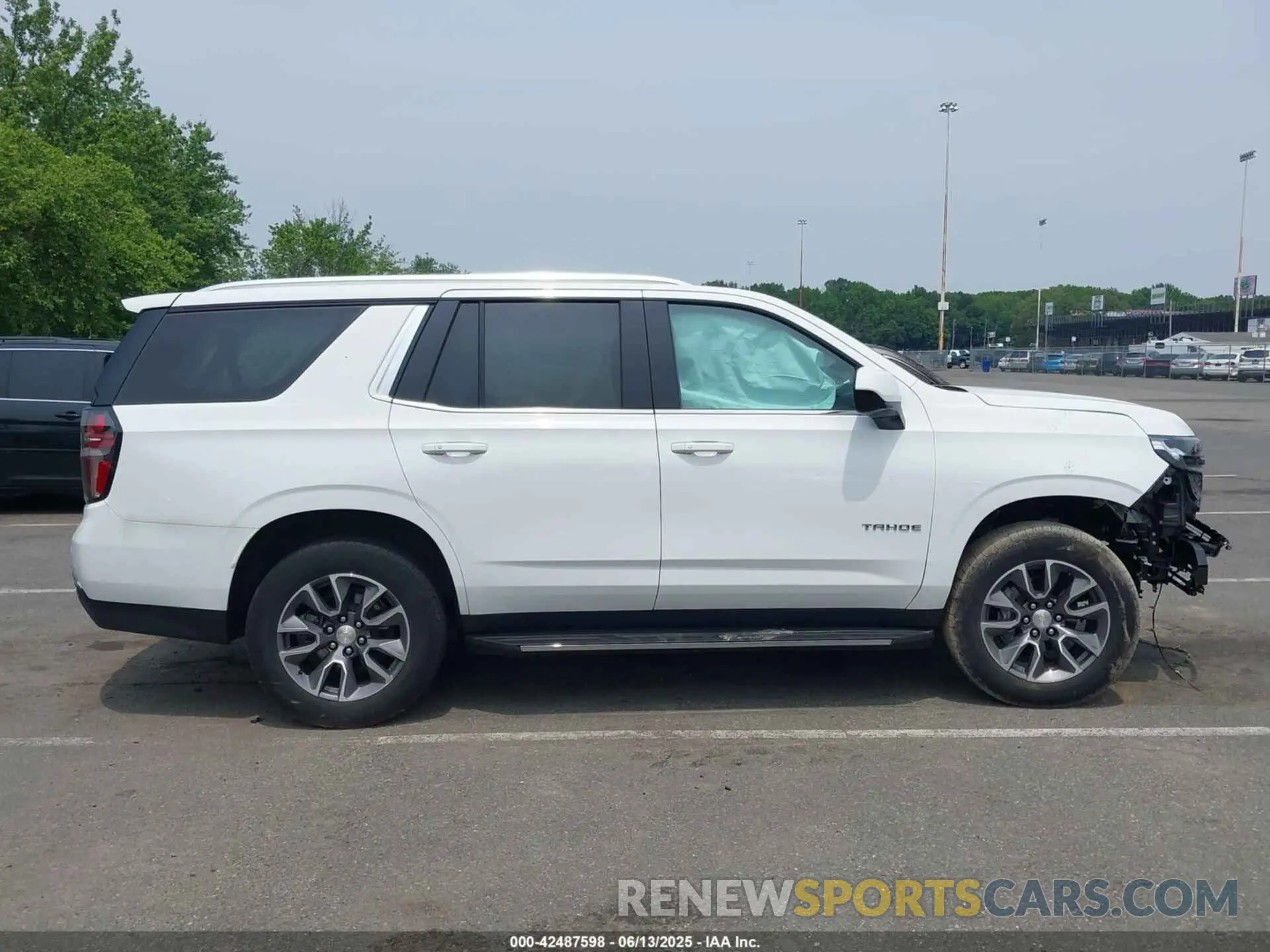 12 Photograph of a damaged car 1GNSKNKD7PR119905 CHEVROLET TAHOE 2023