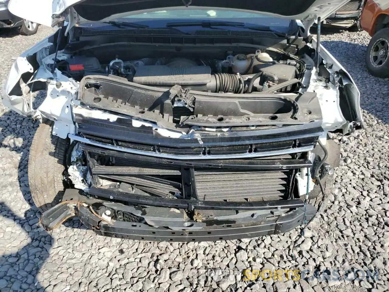 12 Photograph of a damaged car 1GNSKNKD8PR482309 CHEVROLET TAHOE 2023