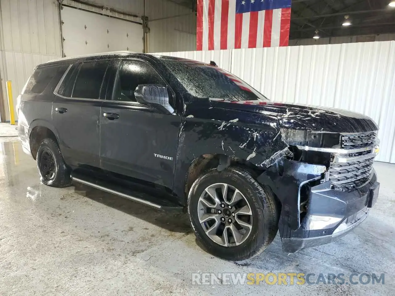4 Photograph of a damaged car 1GNSKNKD9PR440621 CHEVROLET TAHOE 2023