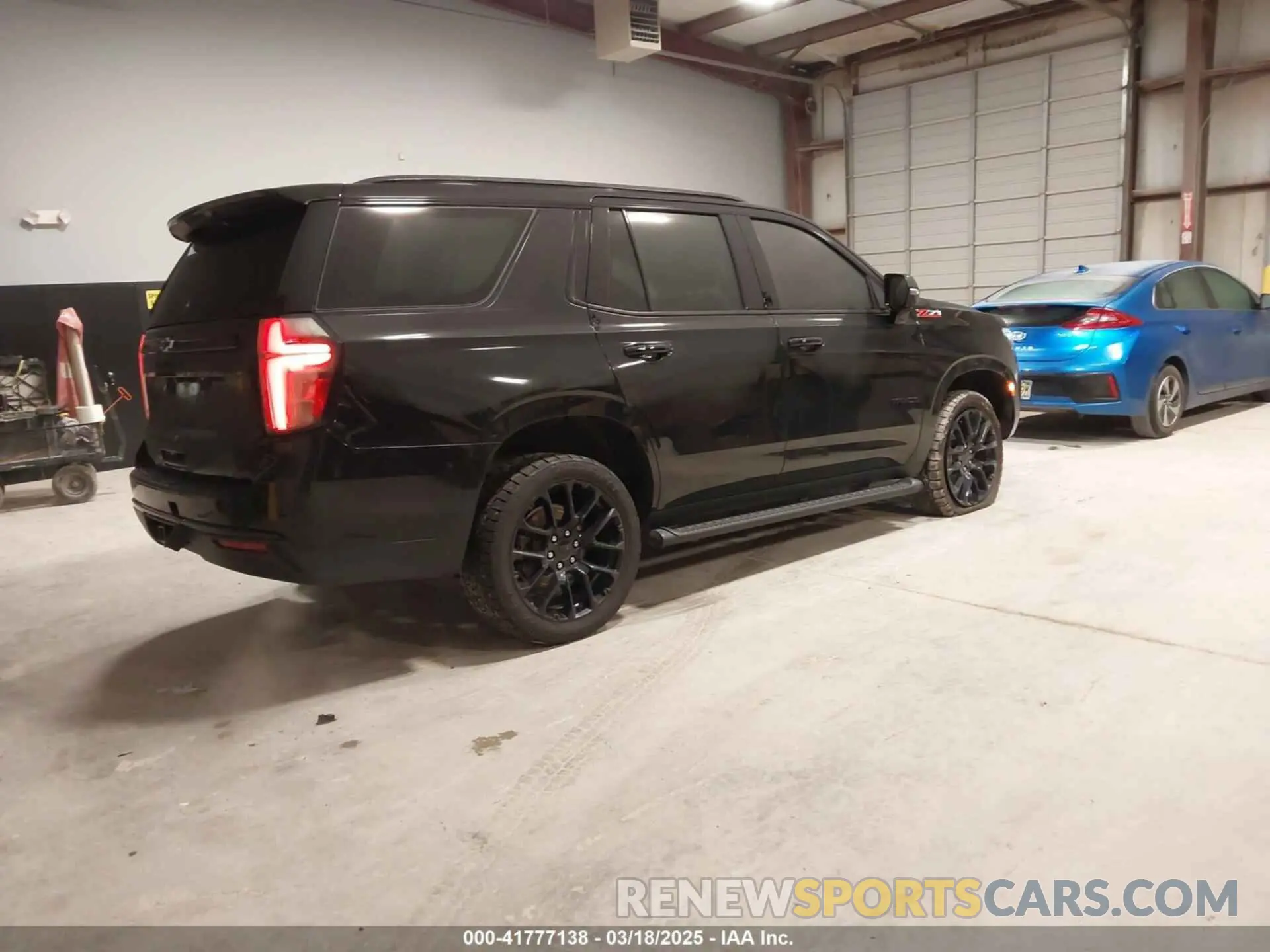 4 Photograph of a damaged car 1GNSKPKD3PR130489 CHEVROLET TAHOE 2023