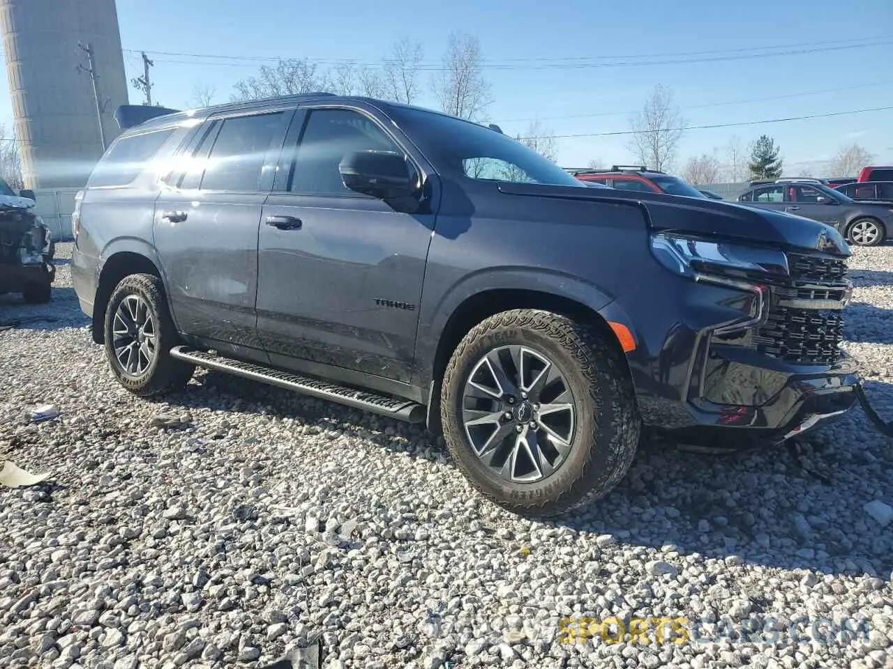 4 Photograph of a damaged car 1GNSKPKD8PR336200 CHEVROLET TAHOE 2023