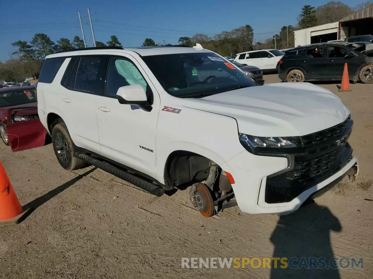 4 Photograph of a damaged car 1GNSKPKL3PR498758 CHEVROLET TAHOE 2023