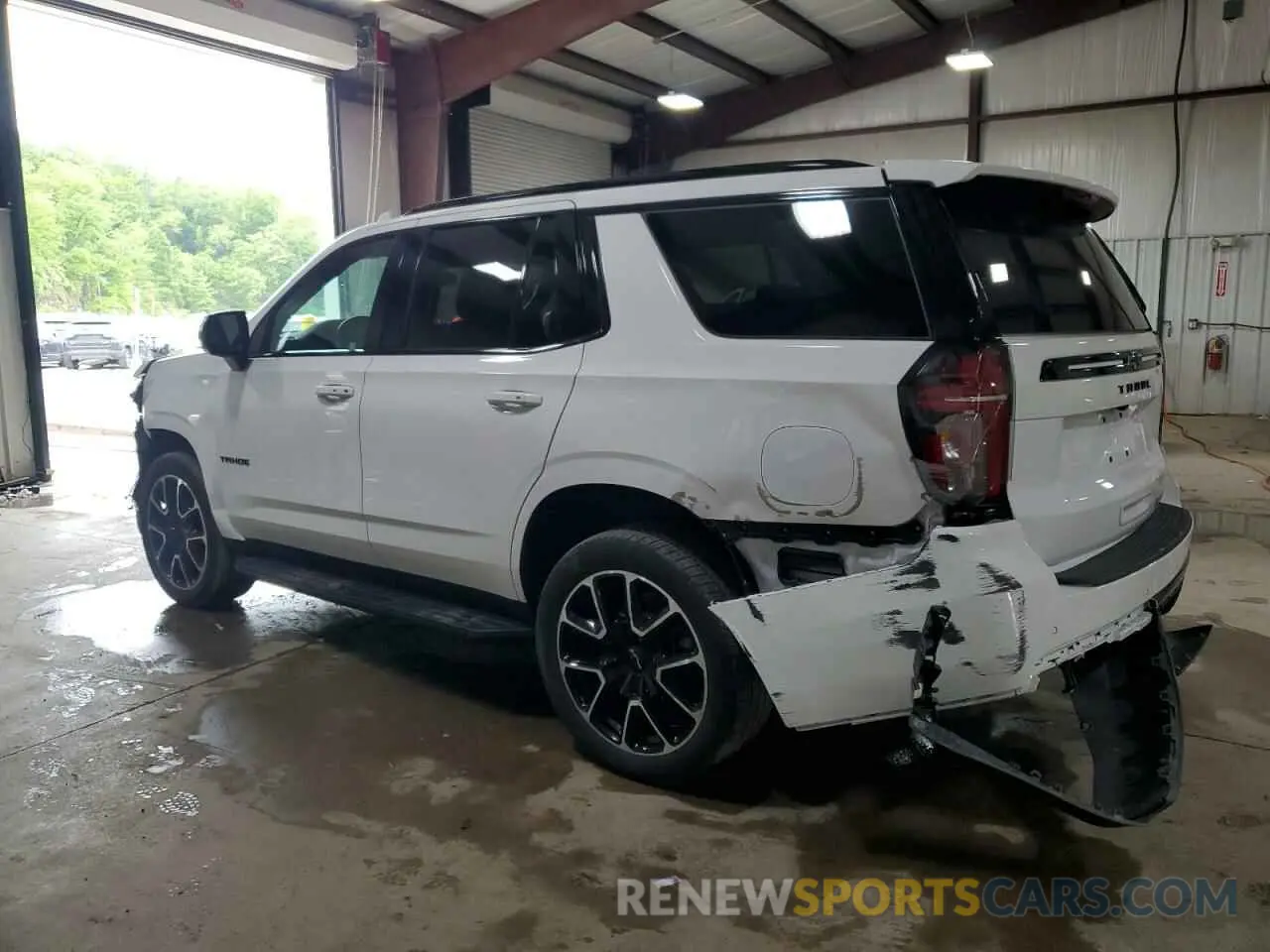 2 Photograph of a damaged car 1GNSKRKD9PR540015 CHEVROLET TAHOE 2023